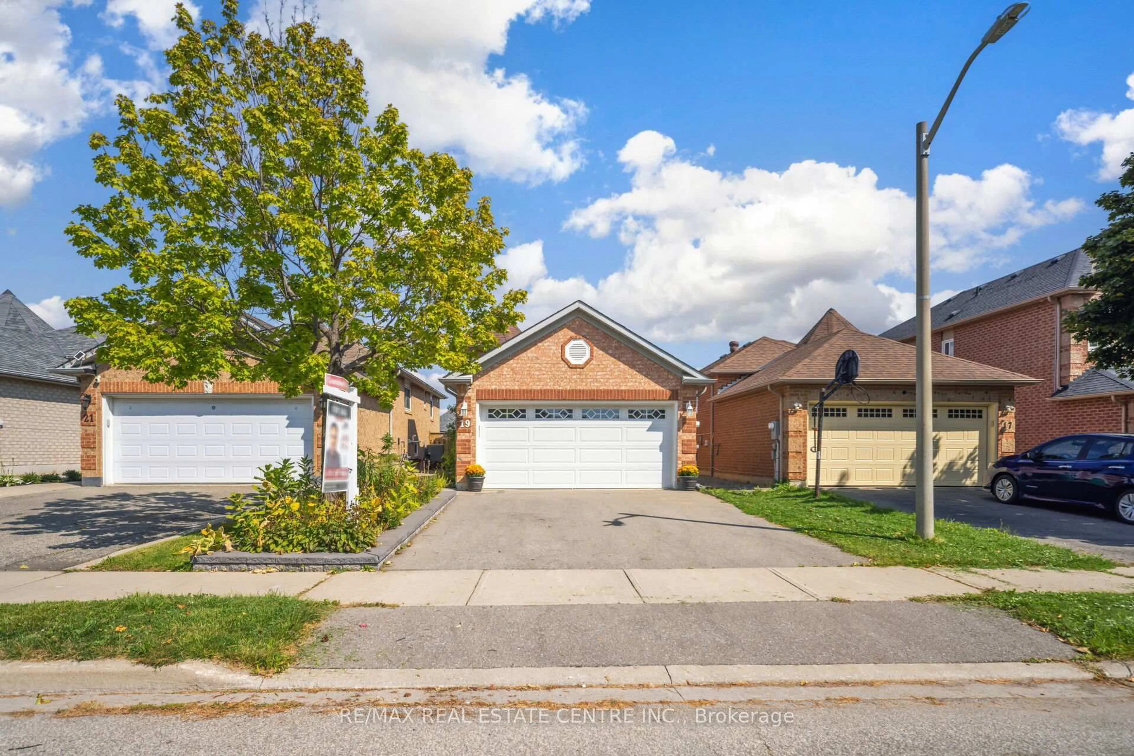 Home with brick exterior material, street for 19 Silkwood Cres, Brampton Ontario L6X 4L1