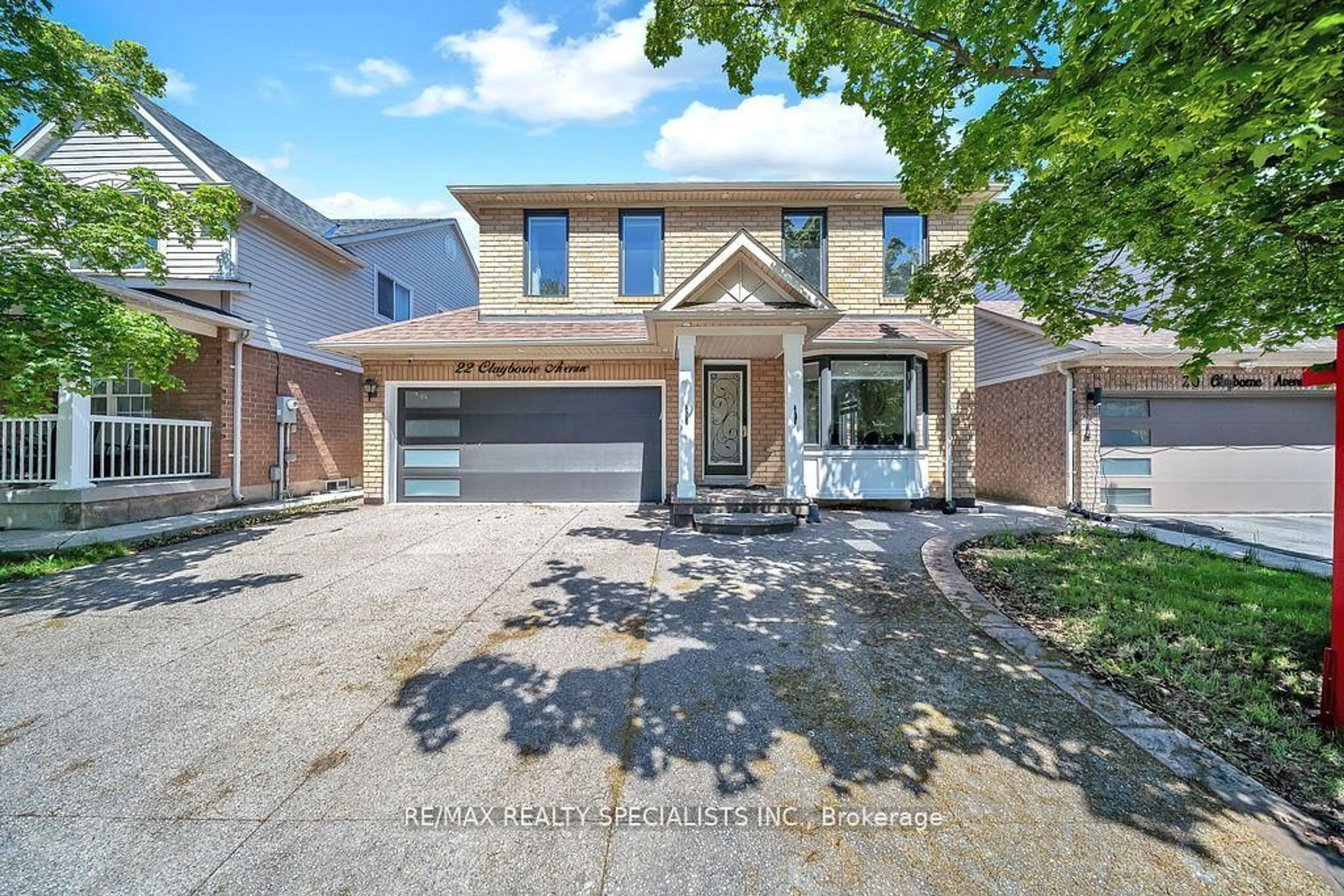 Home with brick exterior material, street for 22 Clayborne Ave, Brampton Ontario L7A 1N8