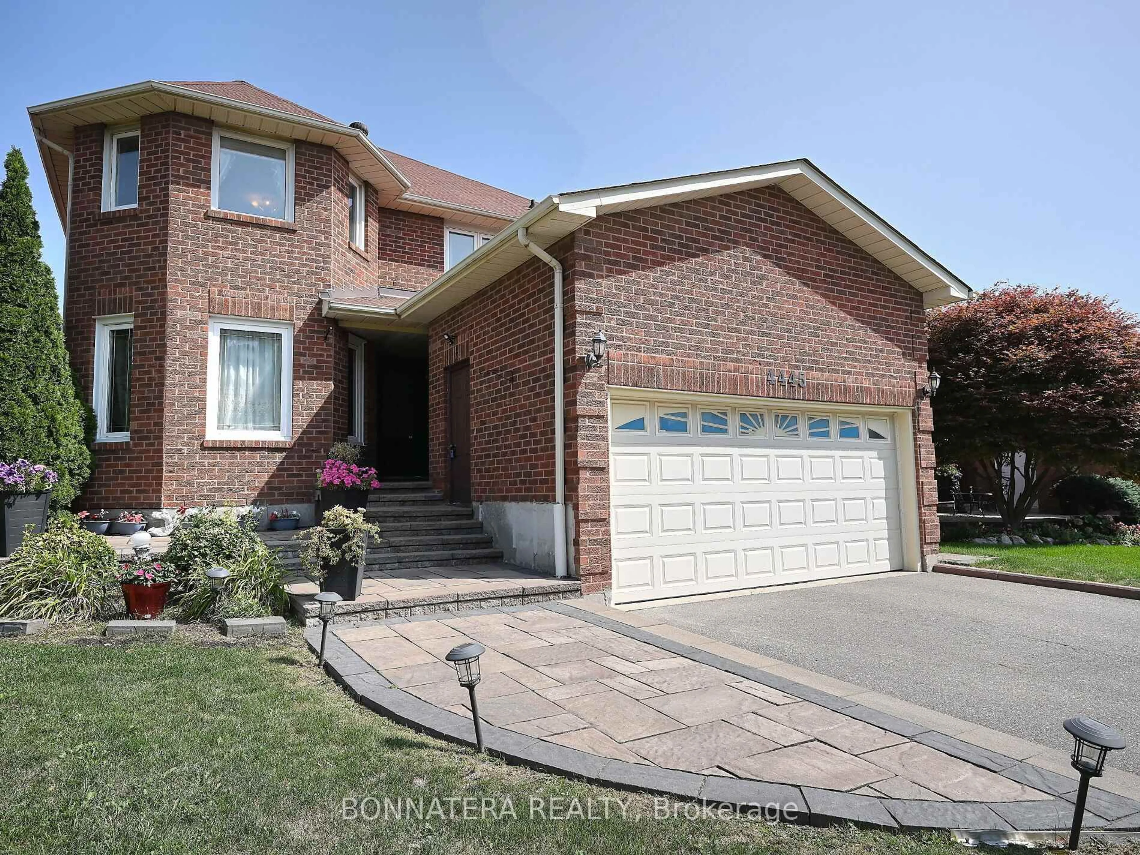 Home with brick exterior material, street for 4445 Guildwood Way, Mississauga Ontario L5R 2B4
