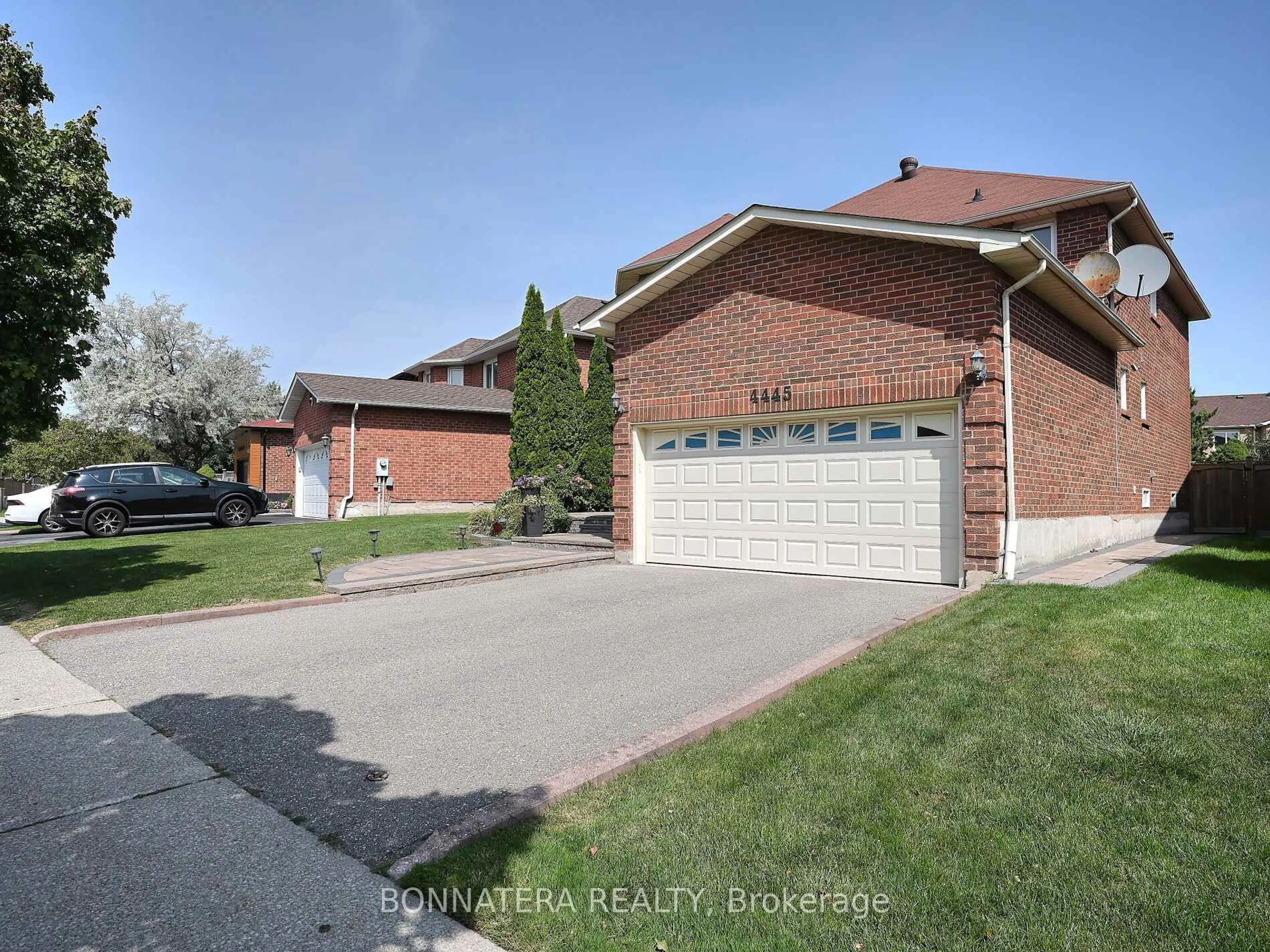 Home with brick exterior material, street for 4445 Guildwood Way, Mississauga Ontario L5R 2B4