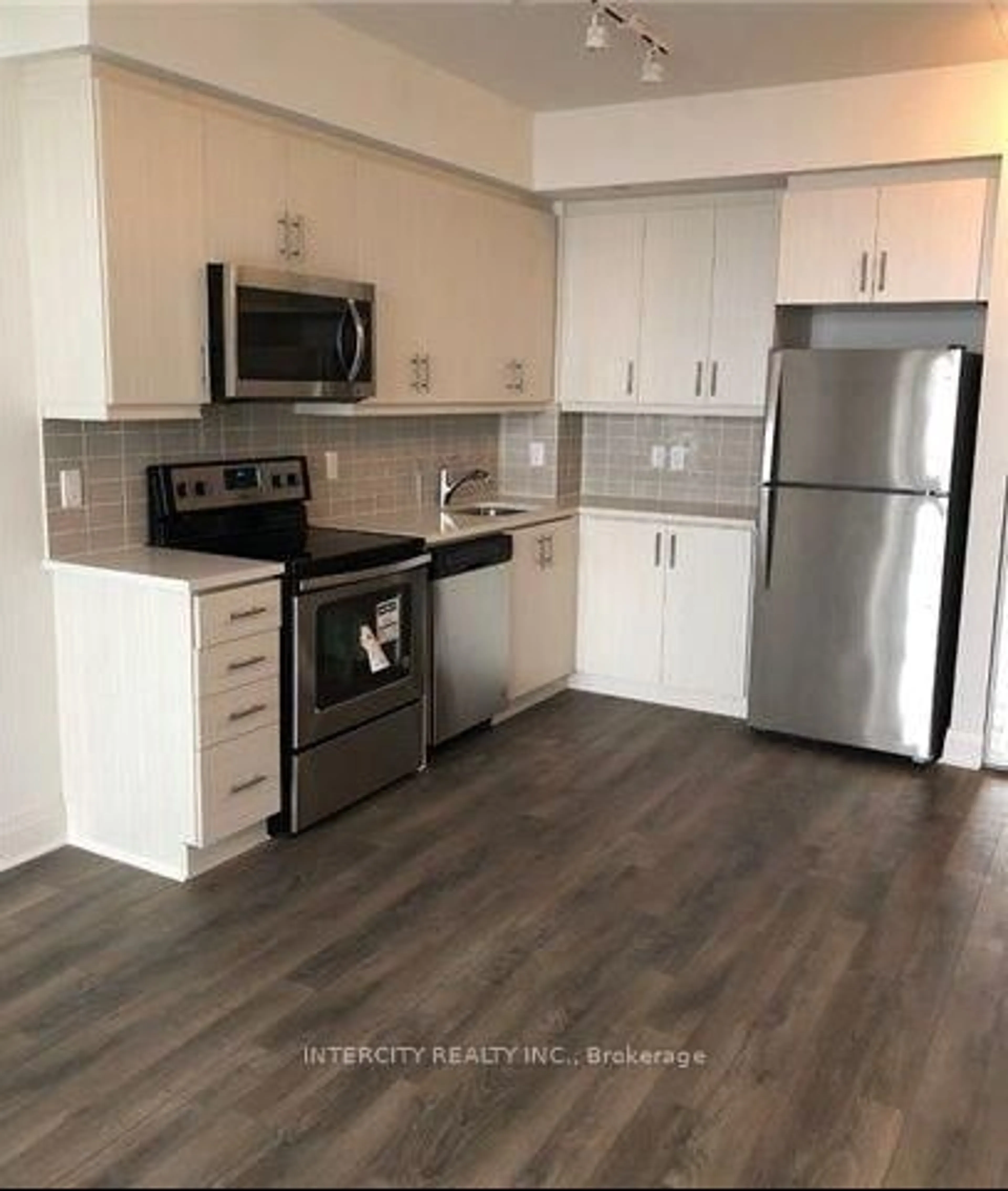 Standard kitchen, wood/laminate floor for 15 Zorra St #2010, Toronto Ontario M8Z 4Z6
