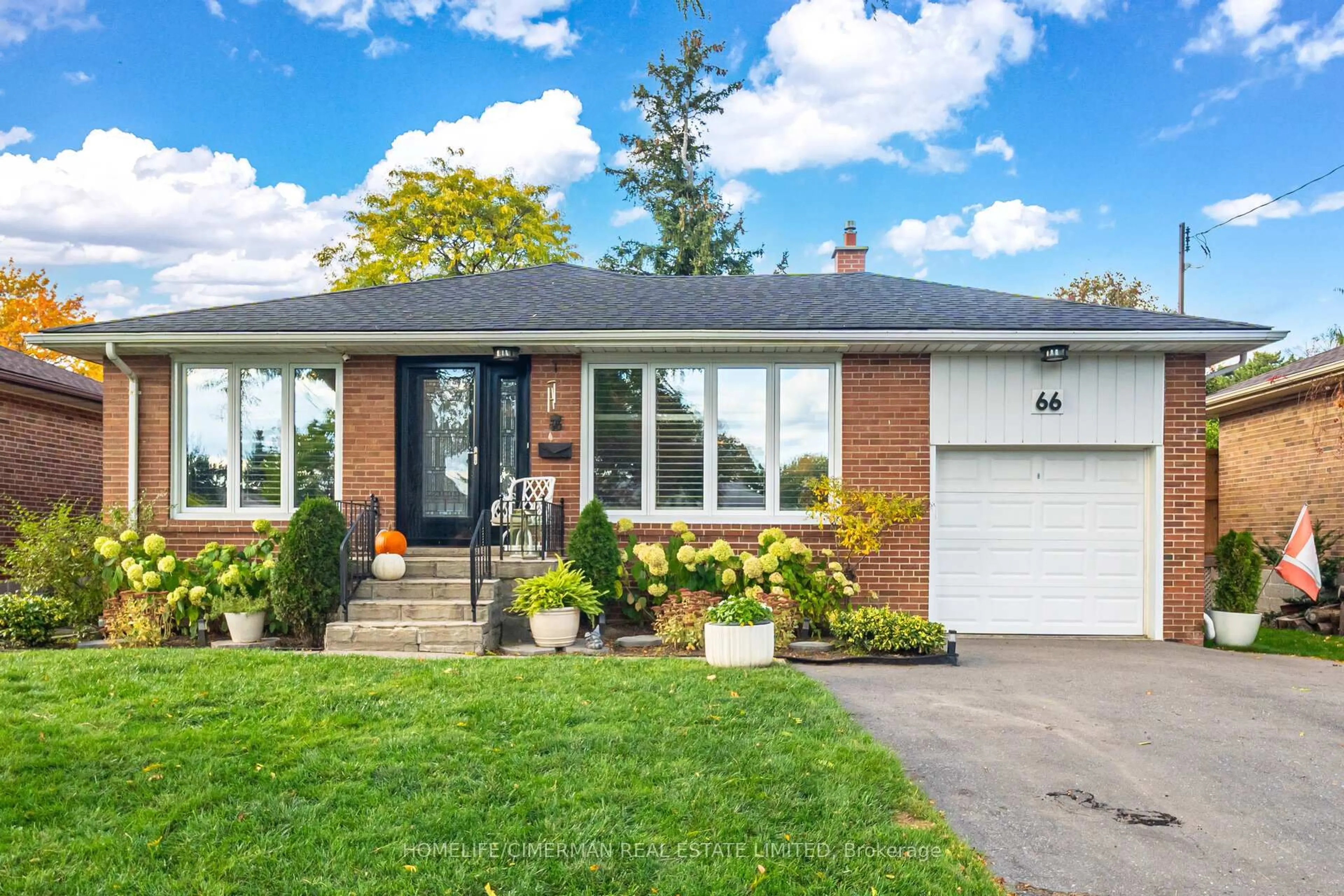 Home with brick exterior material, street for 66 Mooreshead Dr, Toronto Ontario M9C 2S3