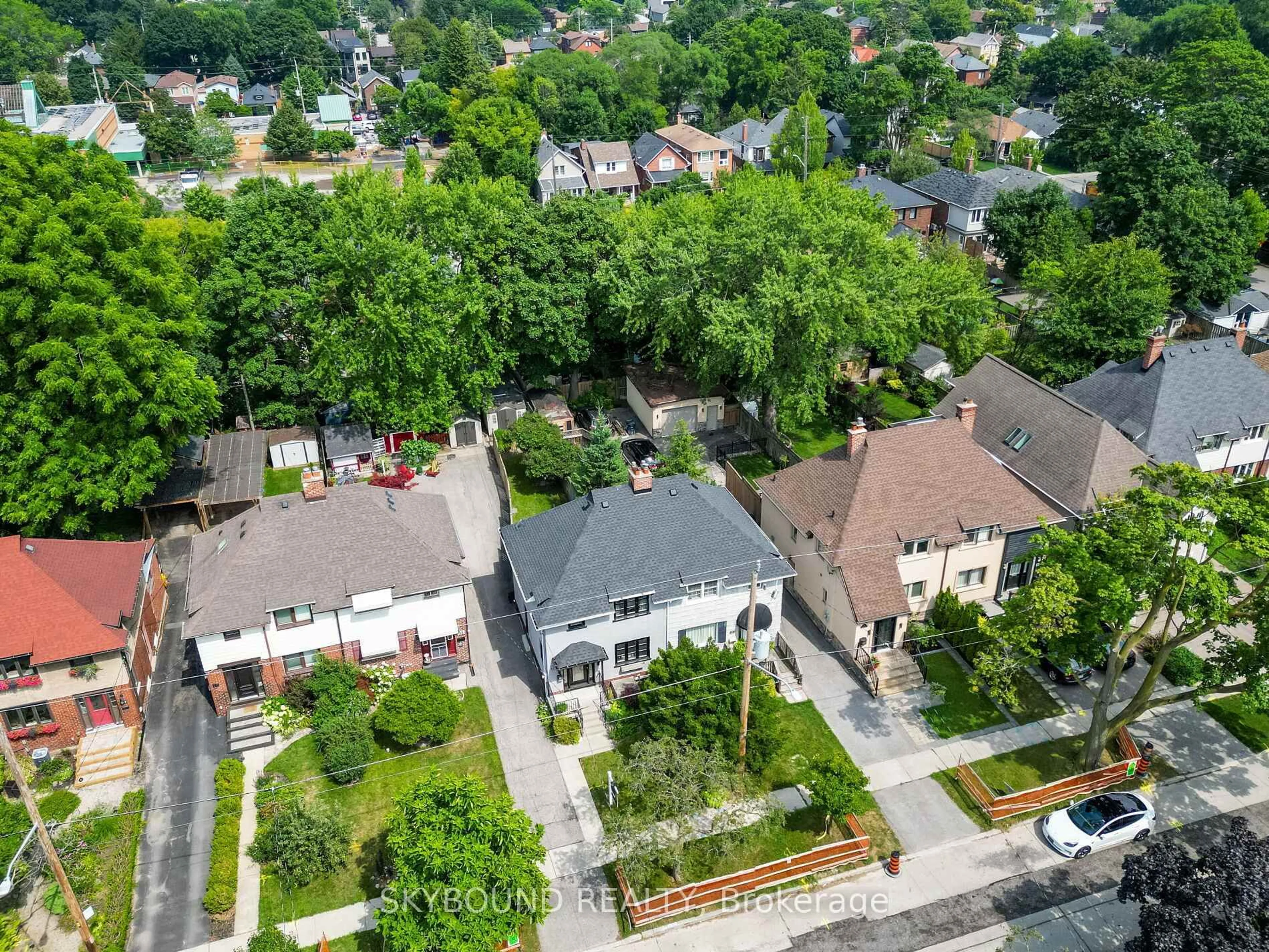 A pic from outside/outdoor area/front of a property/back of a property/a pic from drone, street for 91 Eighth St, Toronto Ontario M8V 3C5
