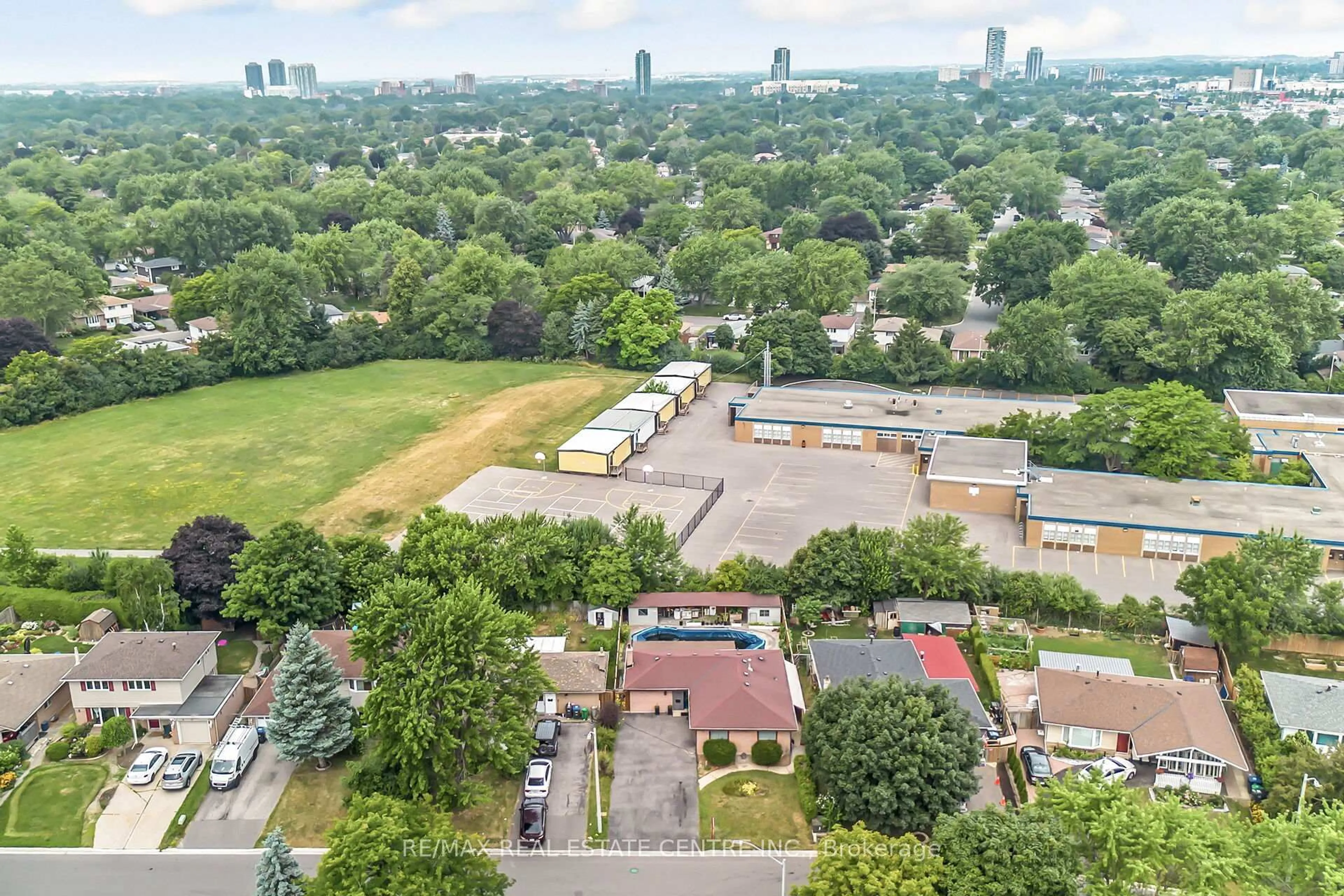 A pic from outside/outdoor area/front of a property/back of a property/a pic from drone, city buildings view from balcony for 9 Watson Cres, Brampton Ontario L6W 1E5