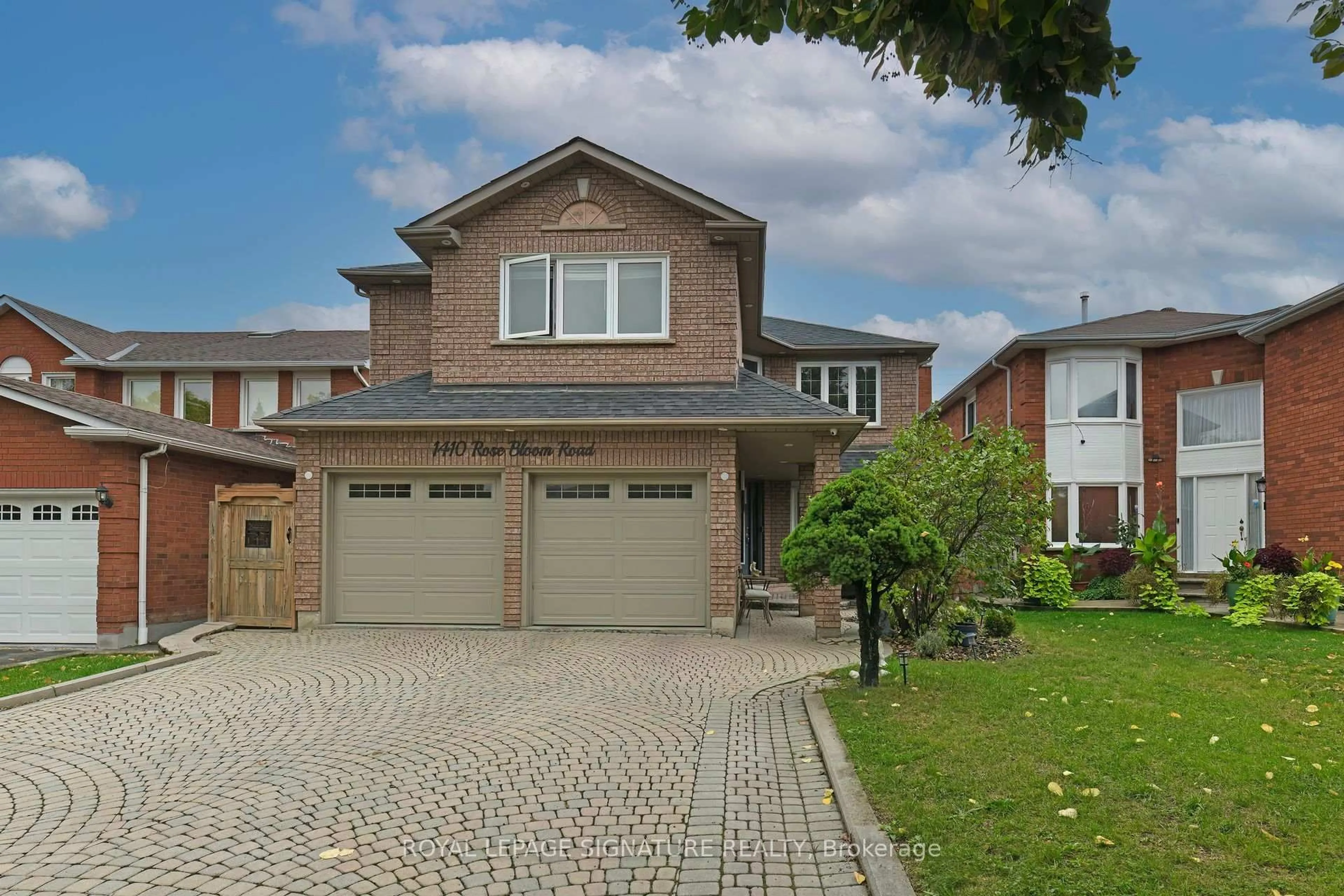 Home with brick exterior material, street for 1410 Rose Bloom Rd, Mississauga Ontario L5V 1H1