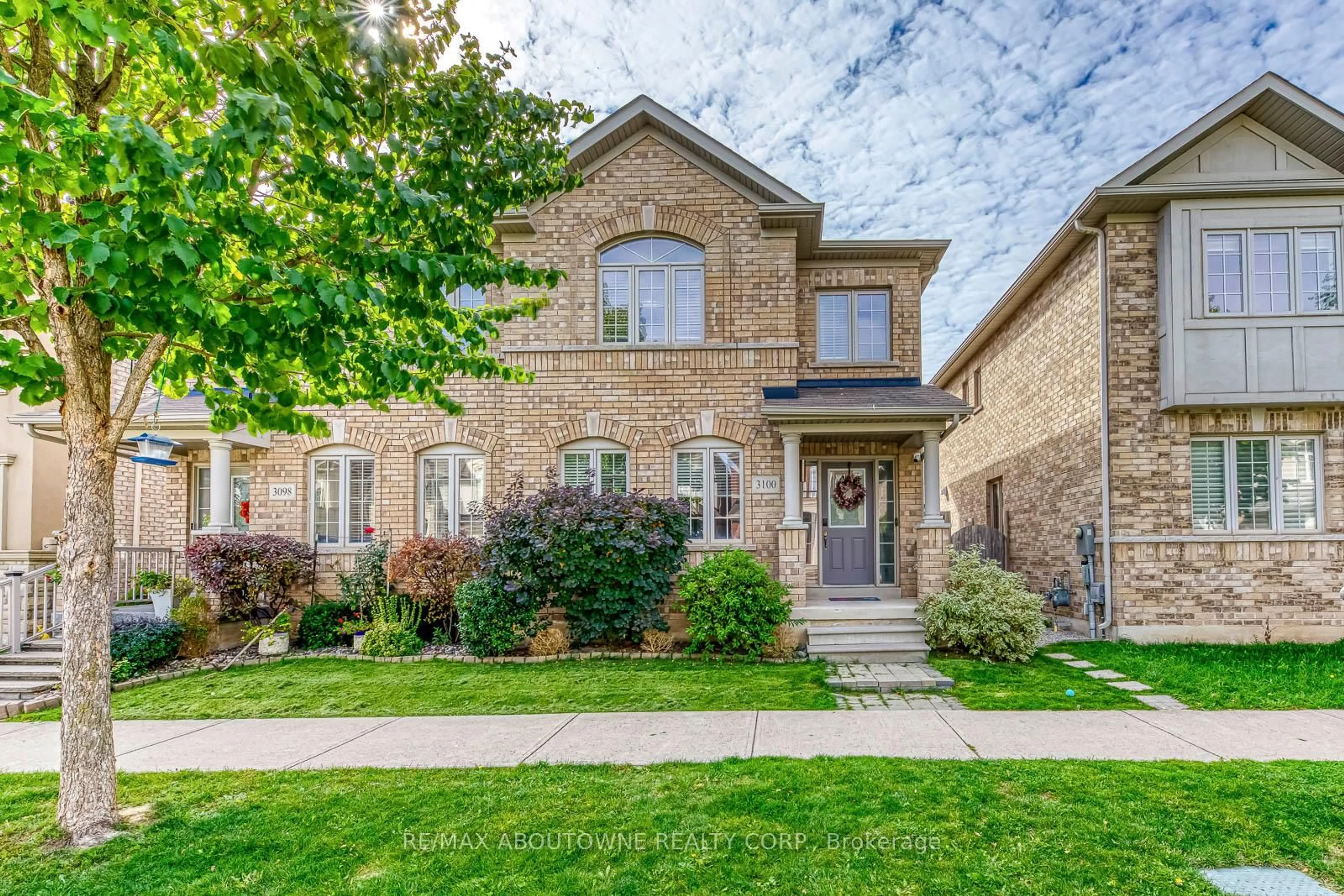 Home with brick exterior material, street for 3100 Robert Brown Blvd, Oakville Ontario L6M 4L7