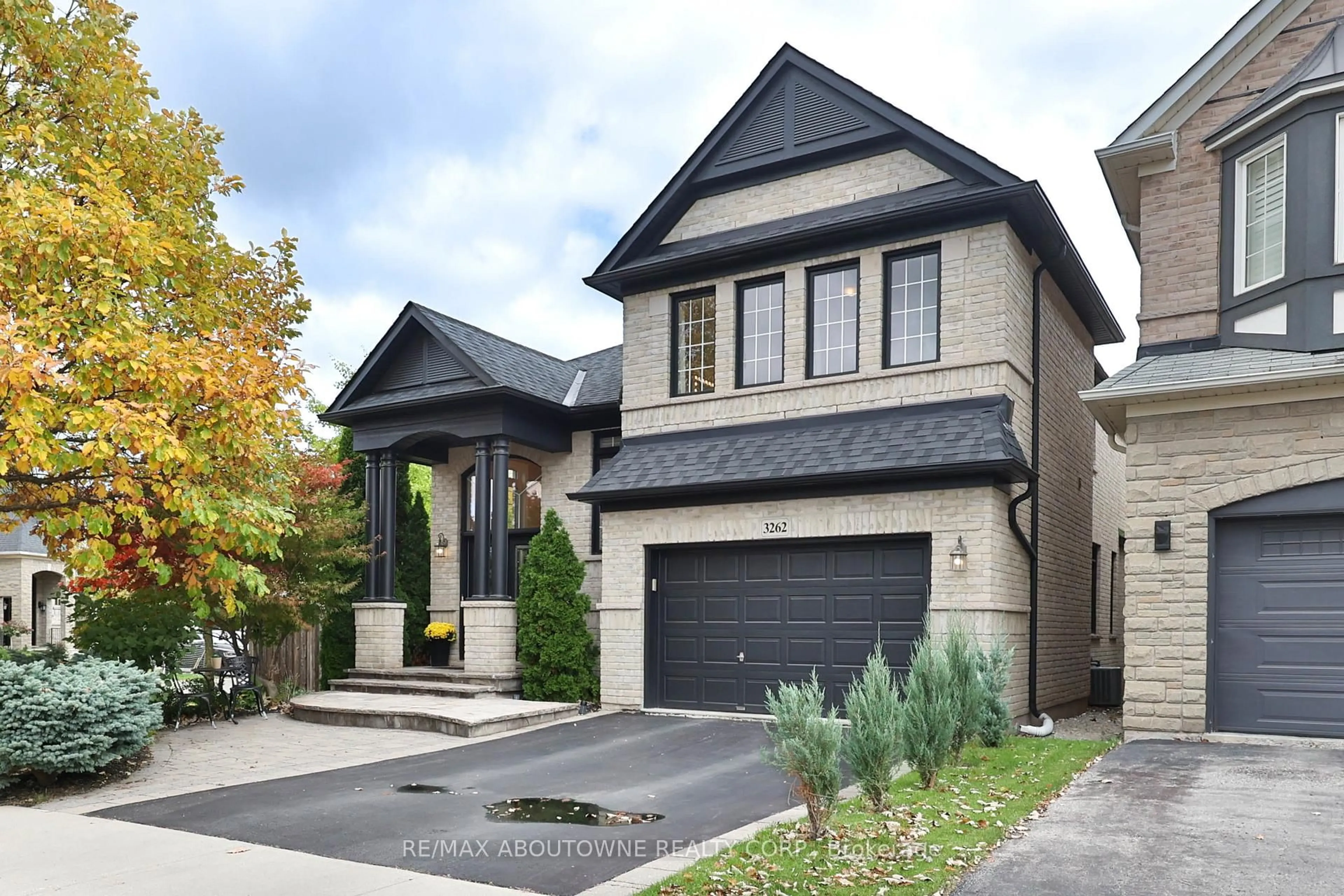 Home with brick exterior material, street for 3262 Skipton Lane, Oakville Ontario L6M 0K2
