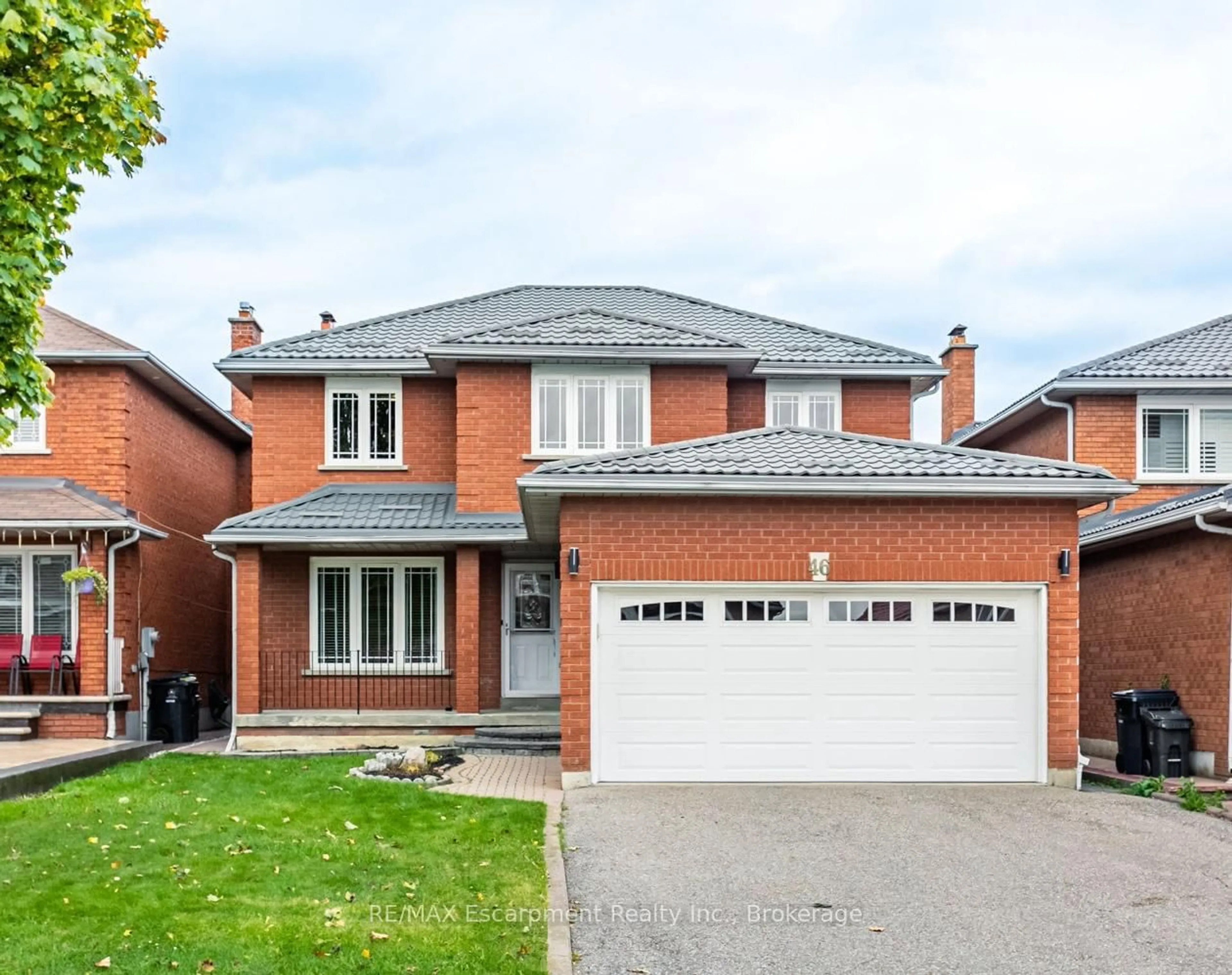 Home with brick exterior material, street for 46 Arborwood Dr, Toronto Ontario M9W 6W3