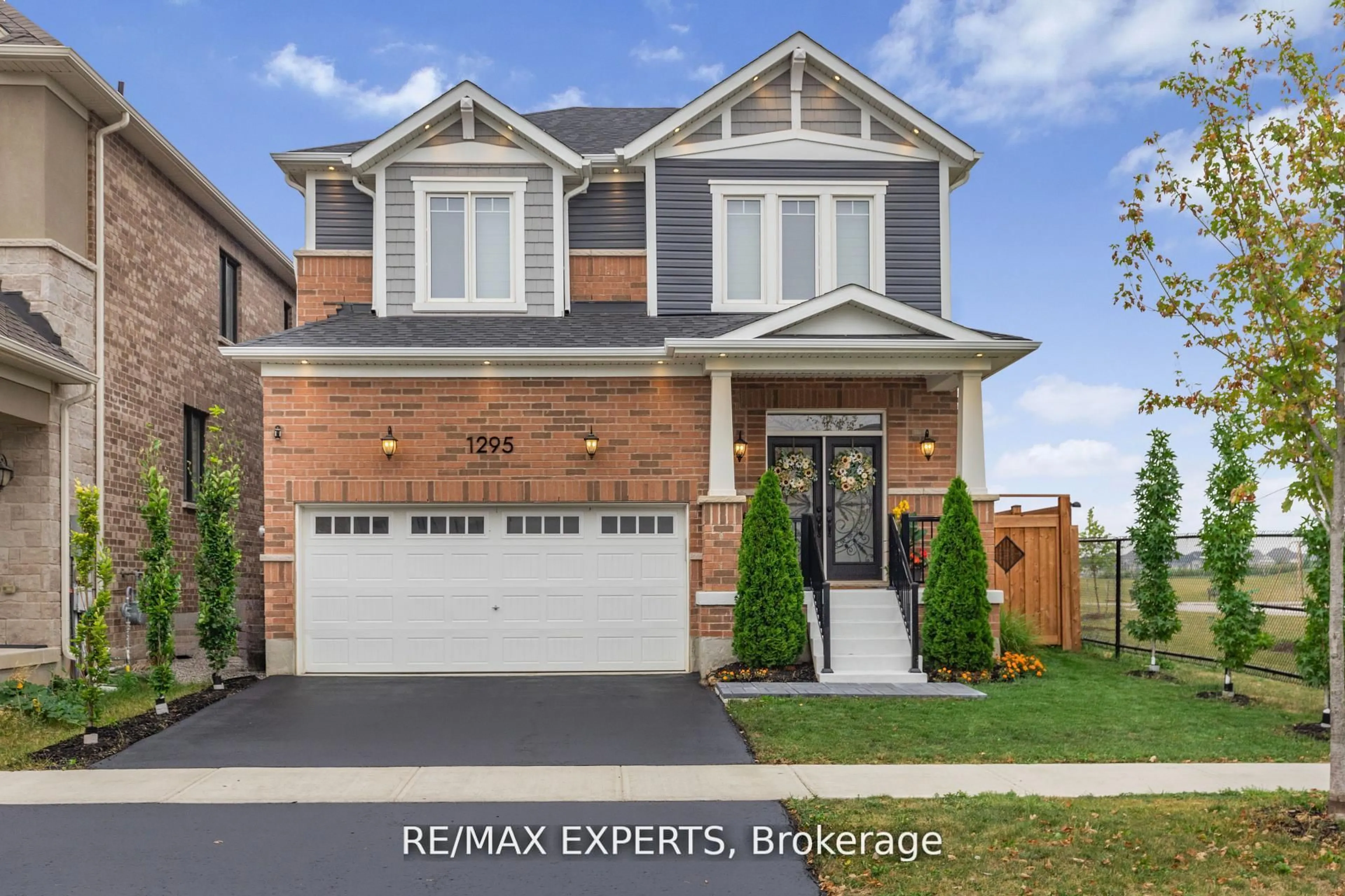 Home with brick exterior material, street for 1295 Kovachik Blvd, Milton Ontario L9E 1W7