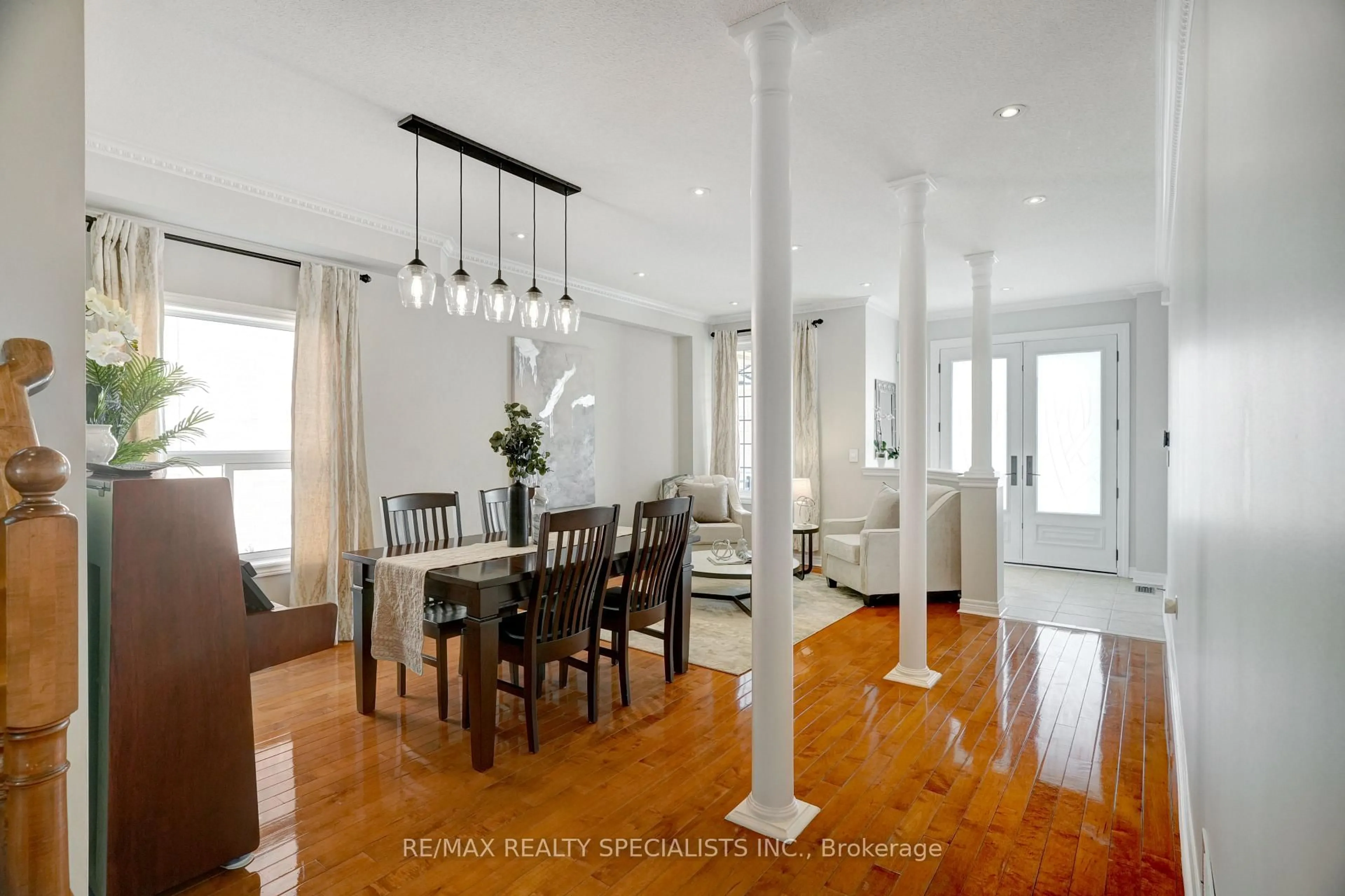 Dining room, wood/laminate floor for 104 Earlsbridge Blvd, Brampton Ontario L7A 3W7
