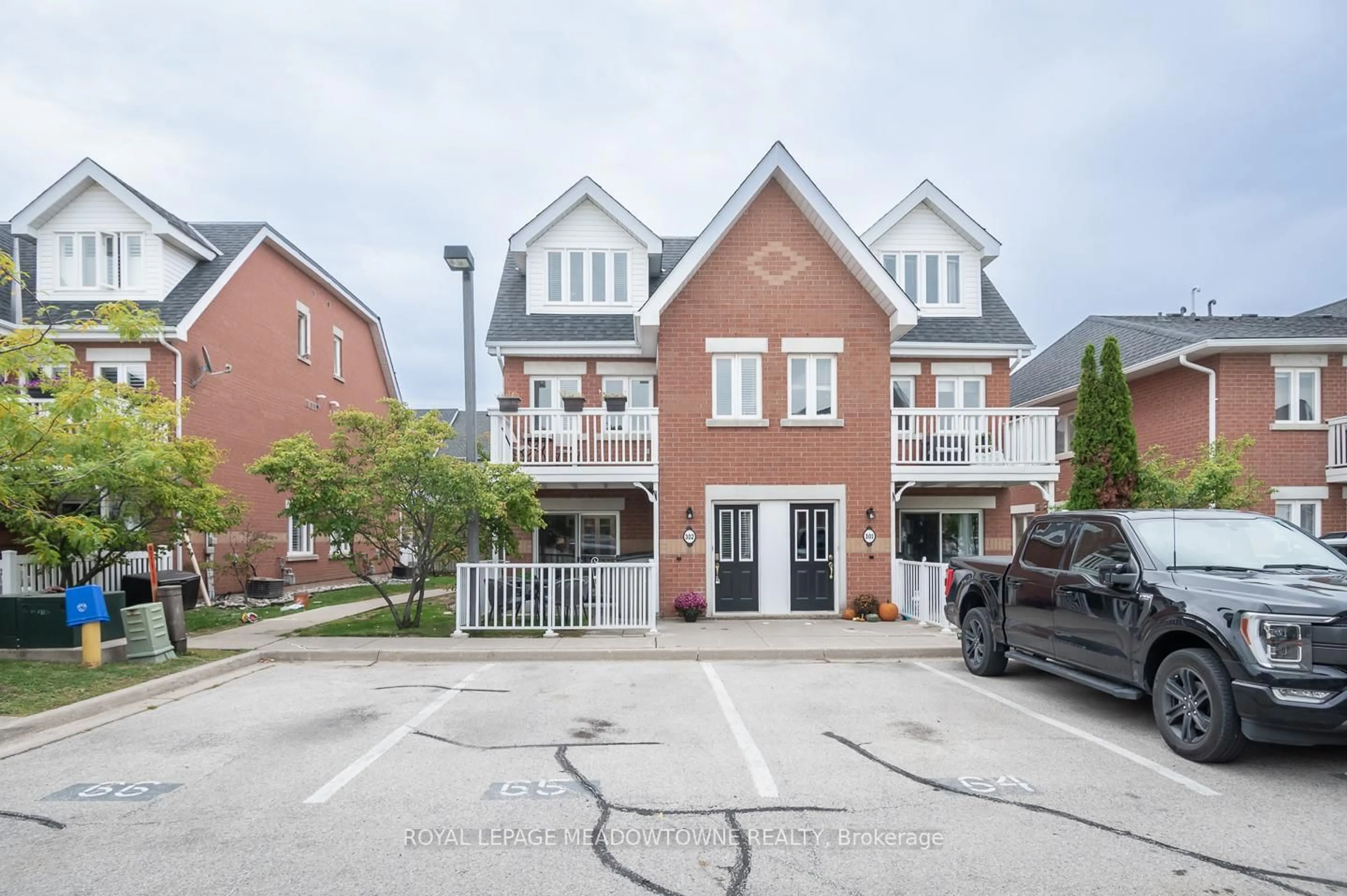 A pic from outside/outdoor area/front of a property/back of a property/a pic from drone, street for 1701 Lampman Ave #302, Burlington Ontario L7L 6R7