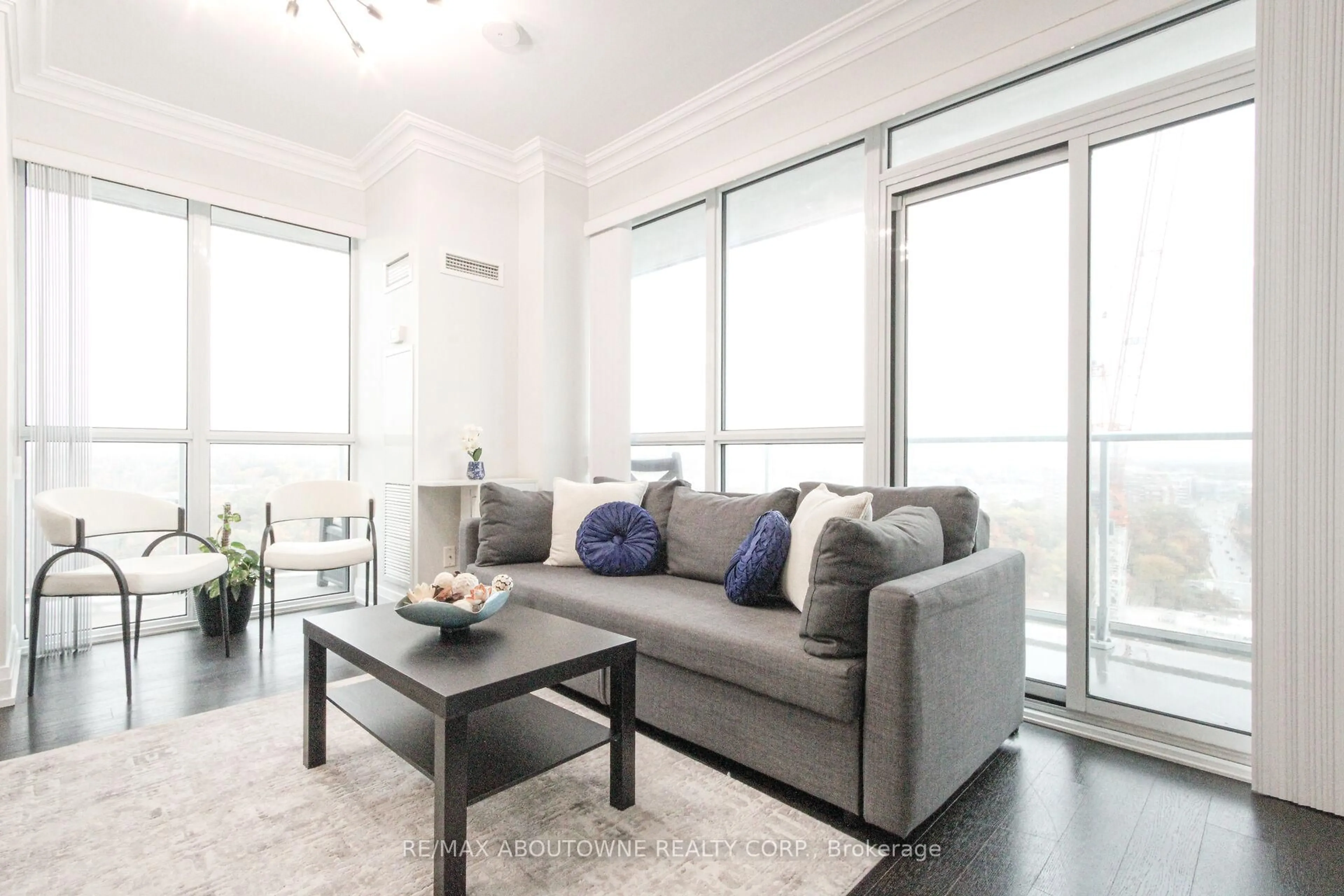 Living room with furniture, unknown for 65 Speers Rd #1503, Oakville Ontario L6K 0J1