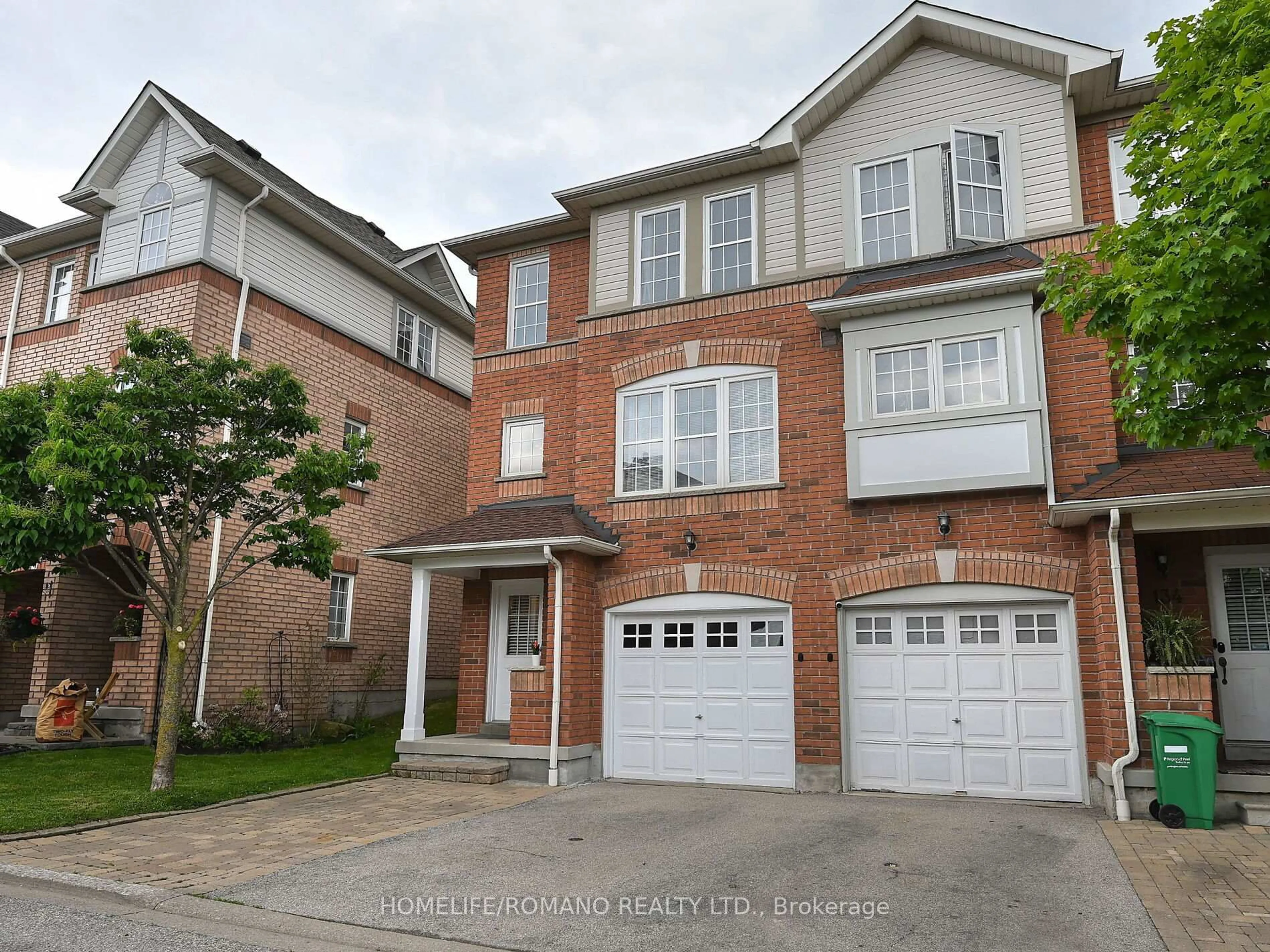 Home with brick exterior material, street for 3030 Breakwater Crt #132, Mississauga Ontario L5B 4N5