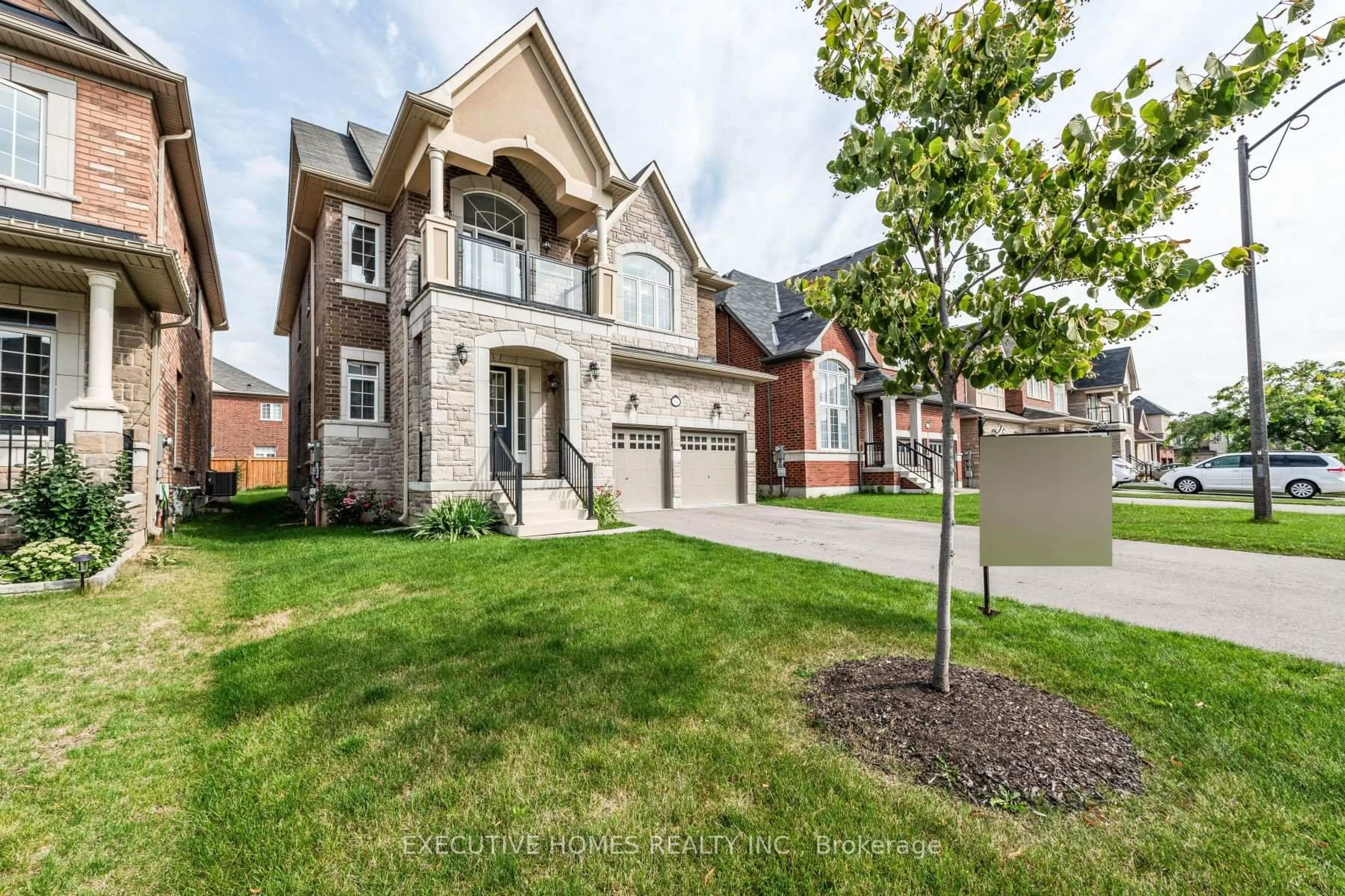 Home with brick exterior material, street for 64 Wildflower Lane, Halton Hills Ontario L7G 0M5