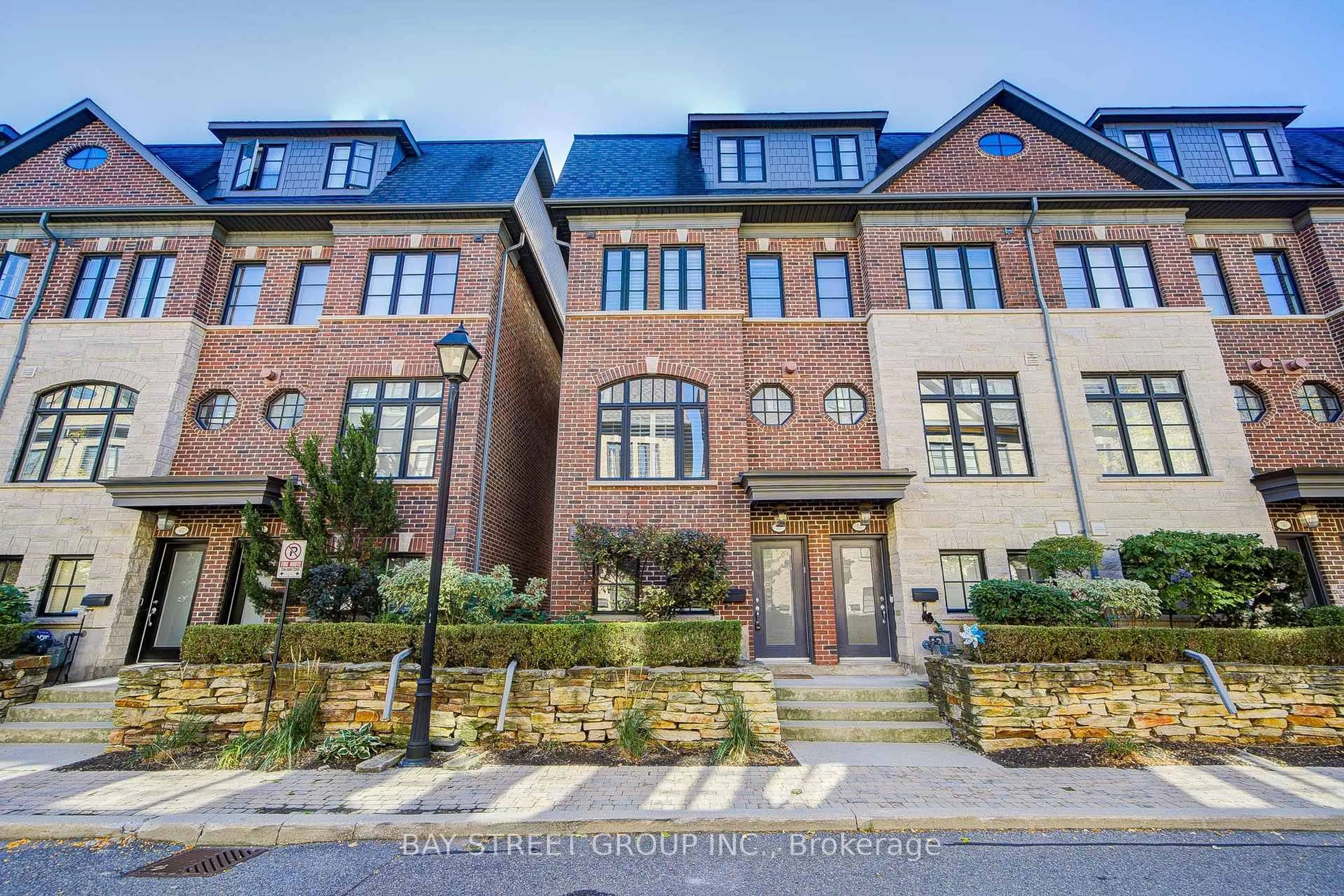 Home with brick exterior material, street for 51 Lobo Mews, Toronto Ontario M8Z 0B2