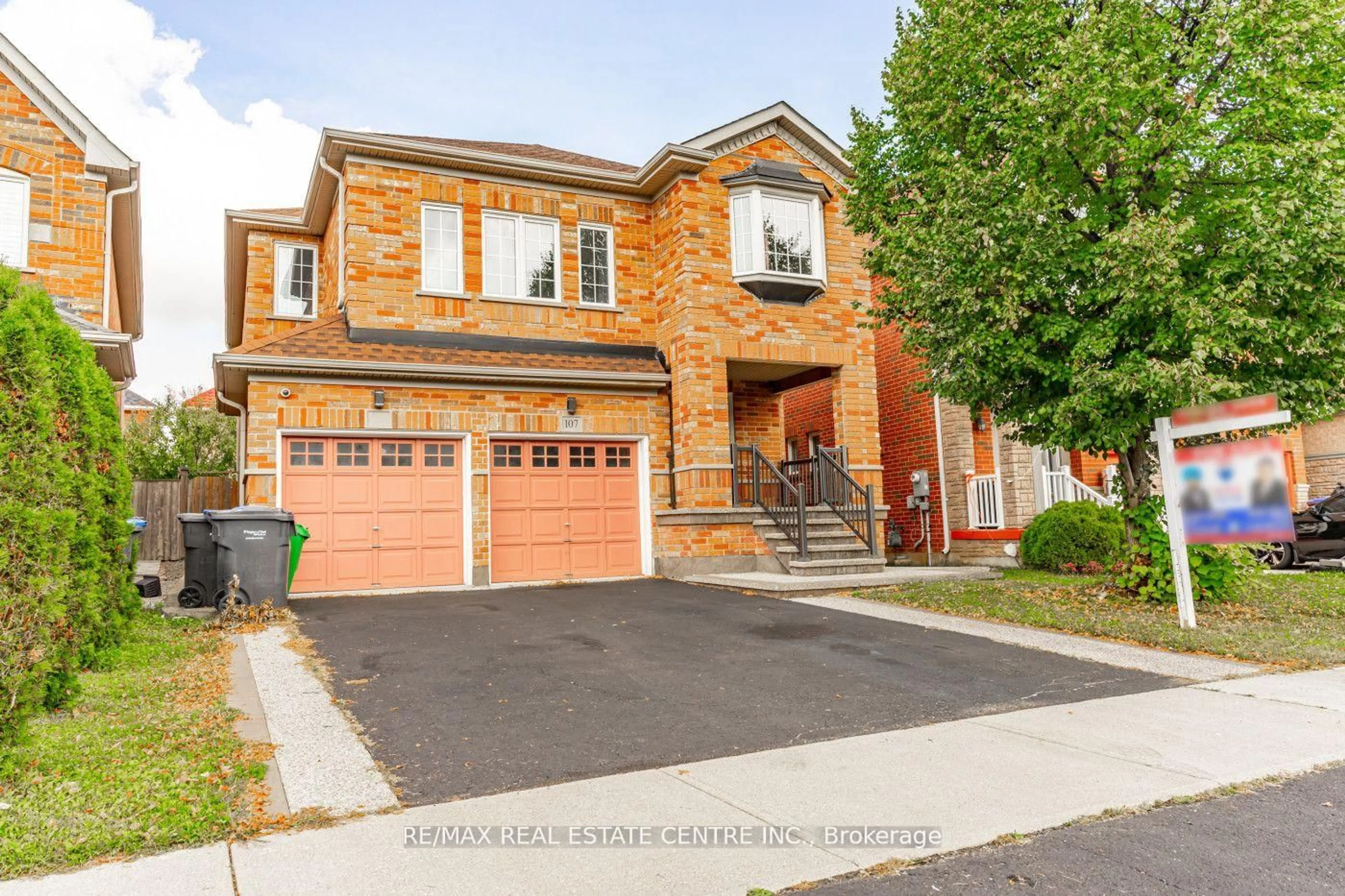 Home with brick exterior material, street for 107 Crown Victoria Dr, Brampton Ontario L7A 3X9