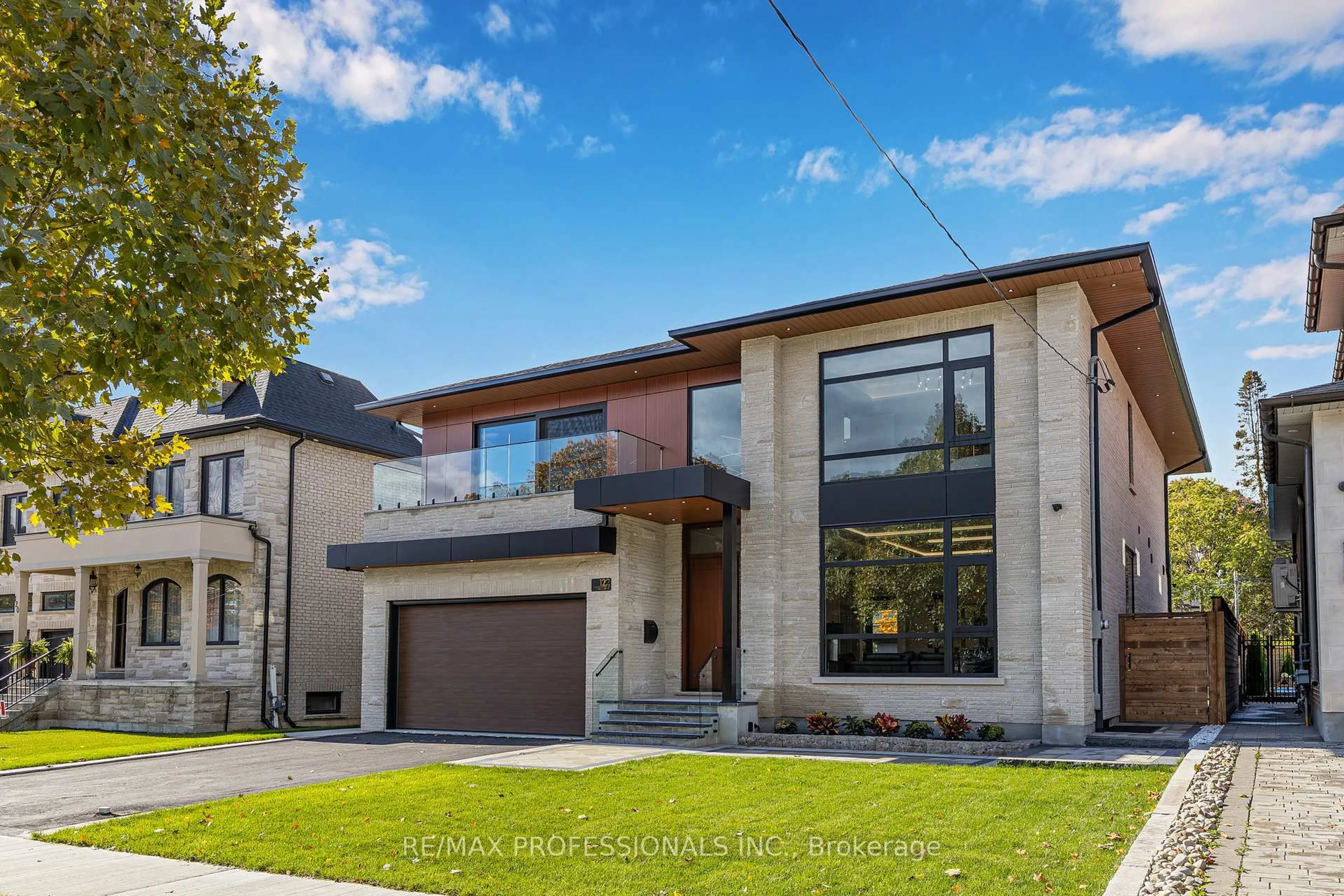 Home with brick exterior material, street for 122 Ashbourne Dr, Toronto Ontario M9B 4H8