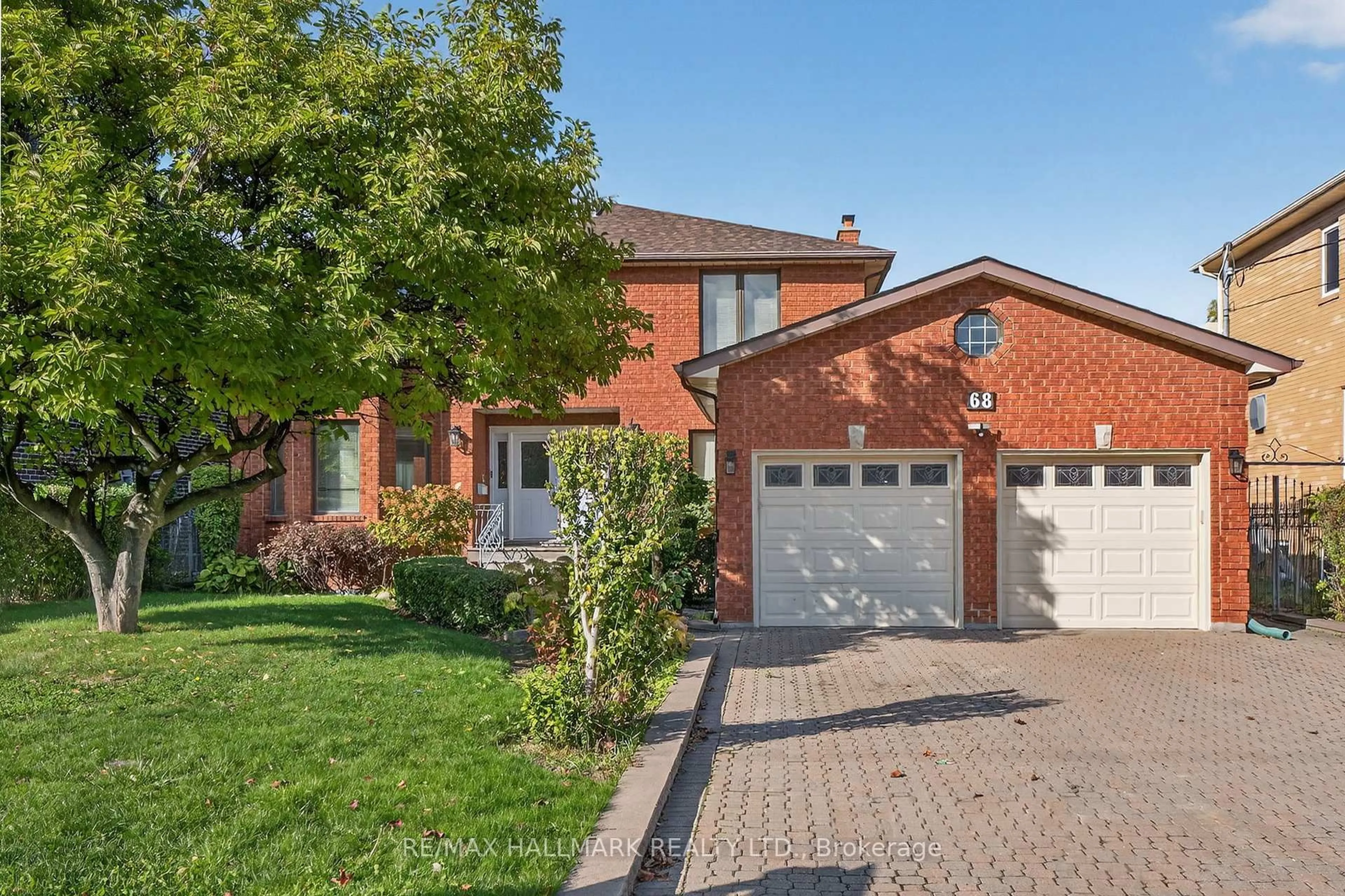 Home with brick exterior material, street for 68 Sunset Tr, Toronto Ontario M9M 1J6