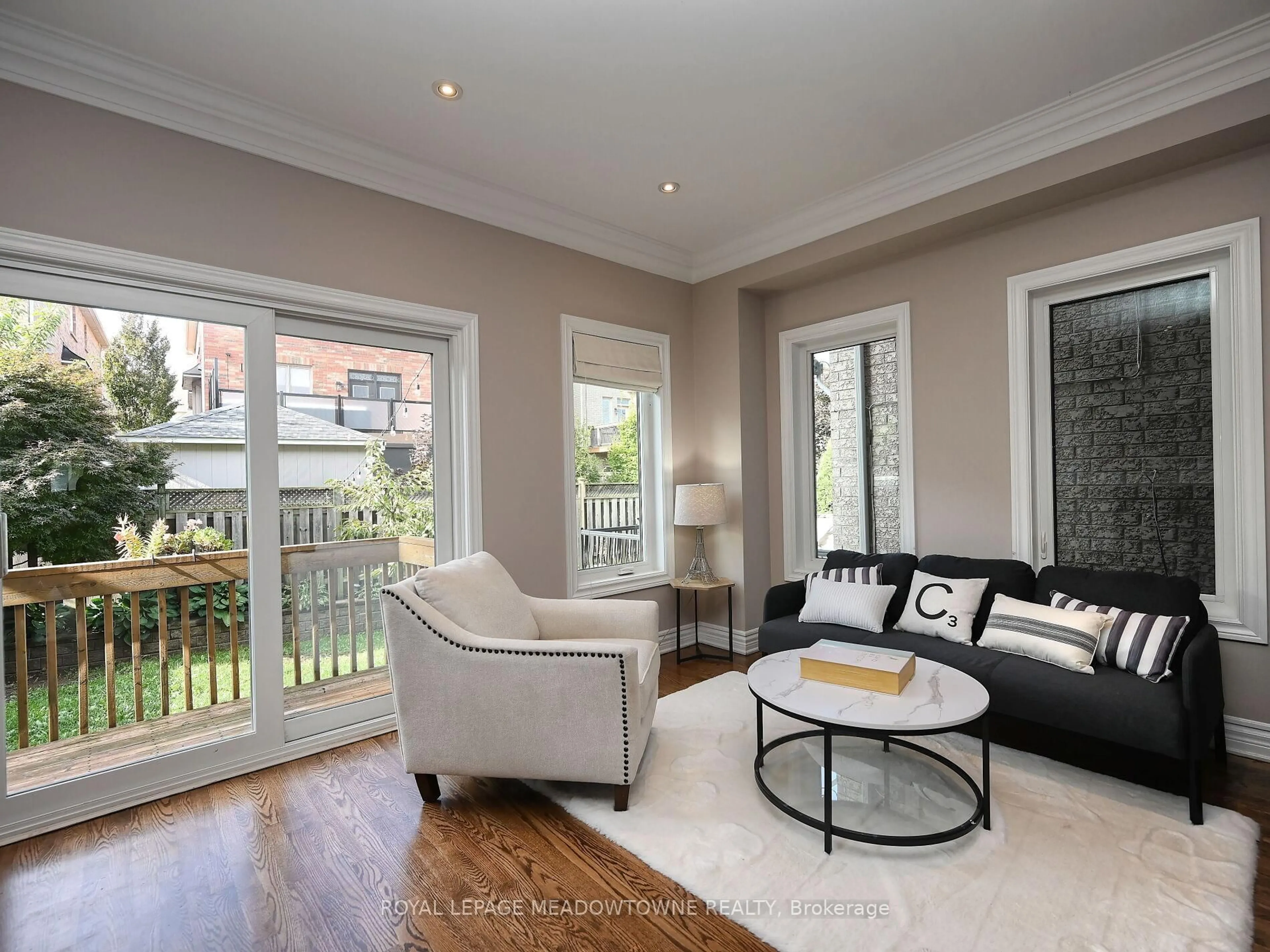 Living room with furniture, wood/laminate floor for 2378 Wasaga Dr, Oakville Ontario L6H 0B7