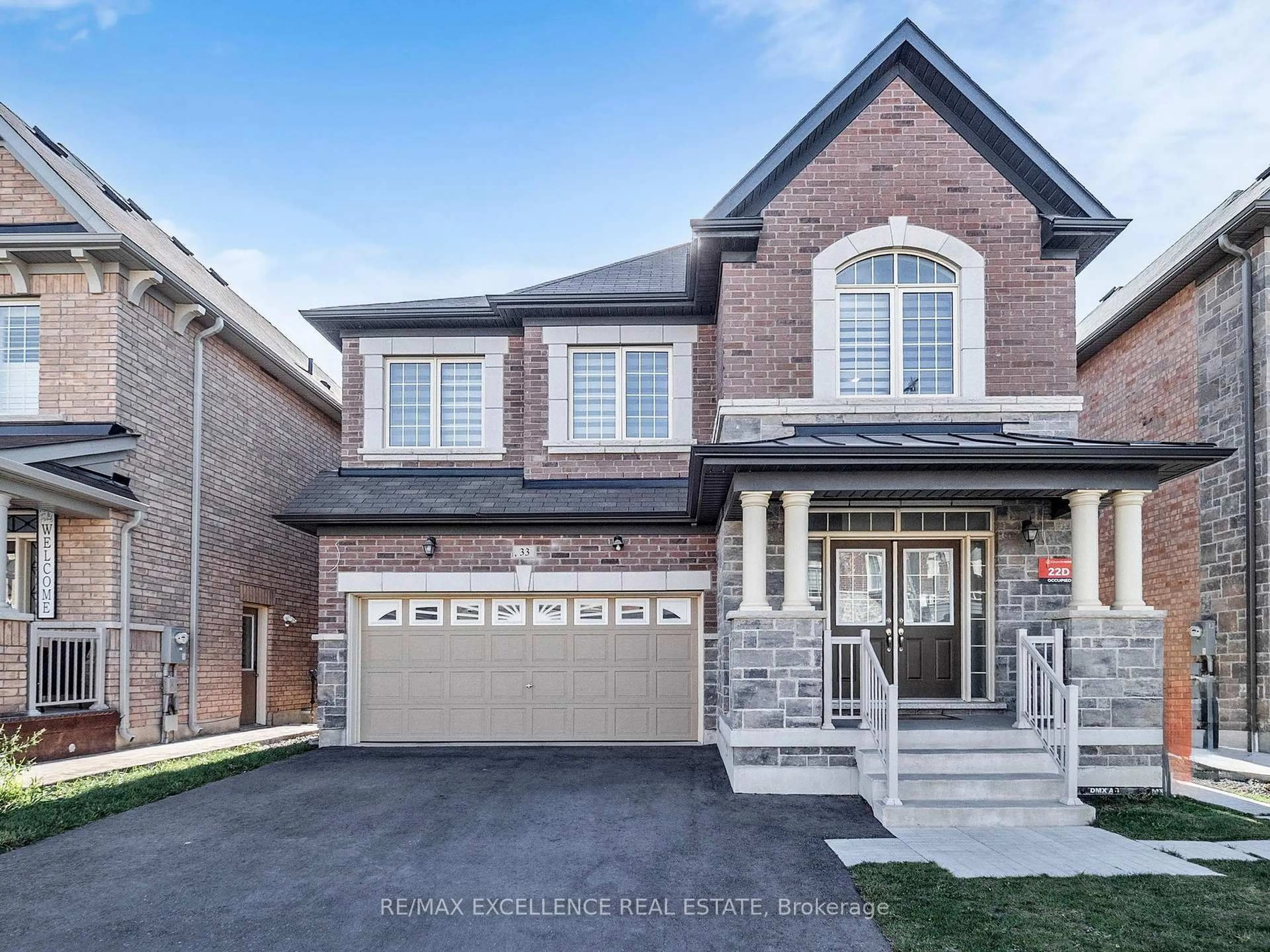 Home with brick exterior material, street for 33 Tiger Cres, Brampton Ontario L6R 0C8