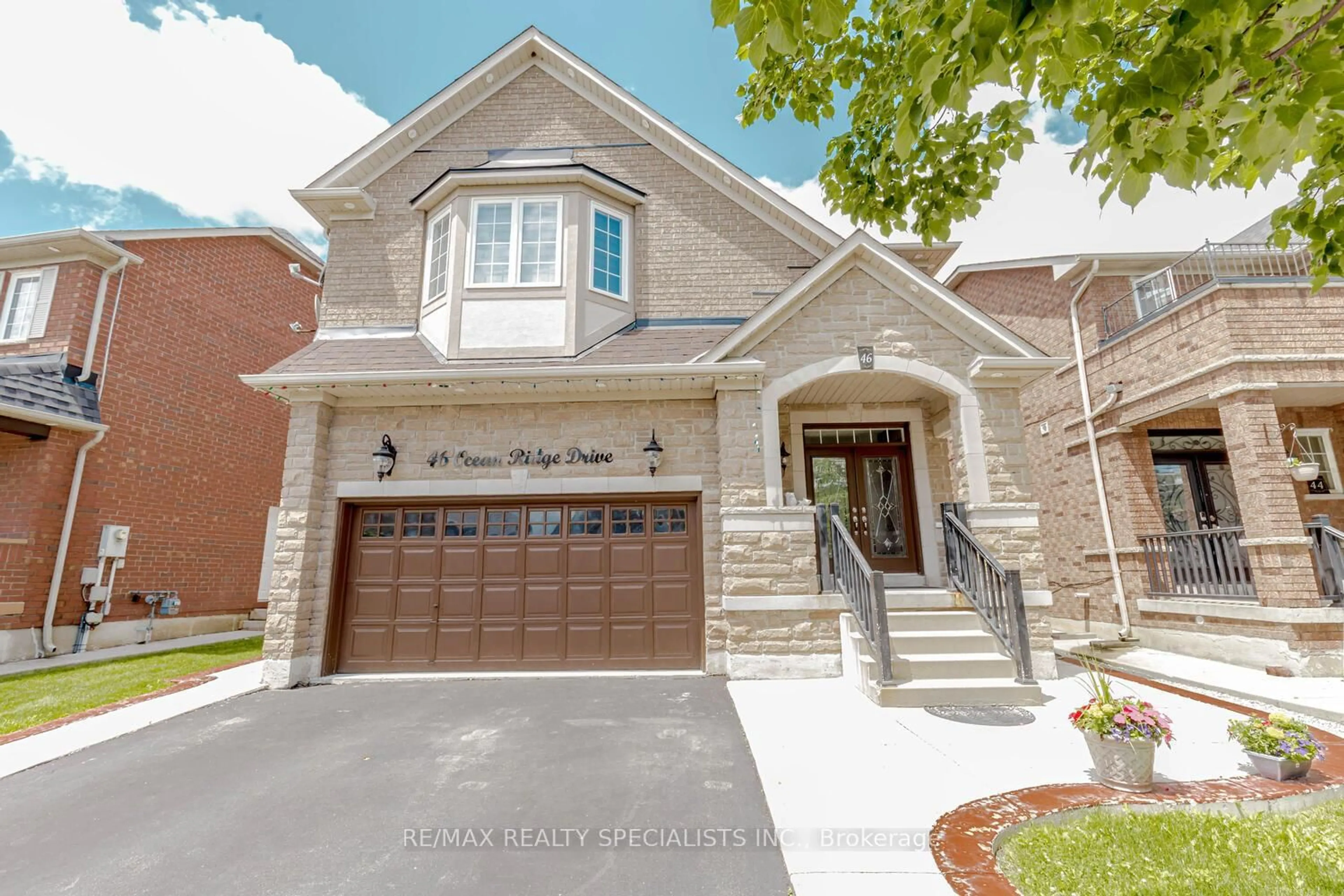 Home with brick exterior material, street for 46 Ocean Ridge Dr, Brampton Ontario L6R 3K5