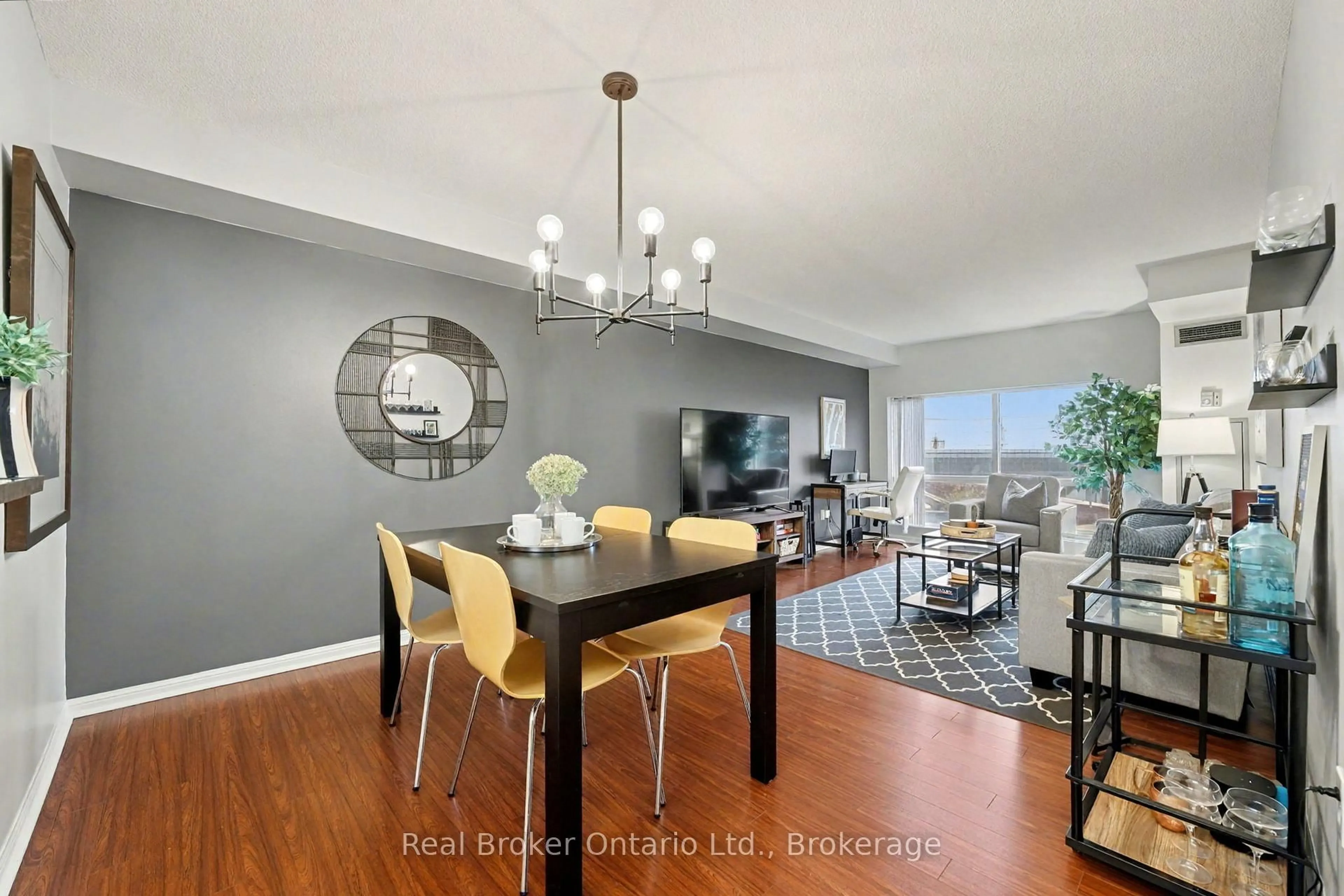 Dining room, wood/laminate floor for 101 SUBWAY Cres #309, Toronto Ontario M9B 6K4