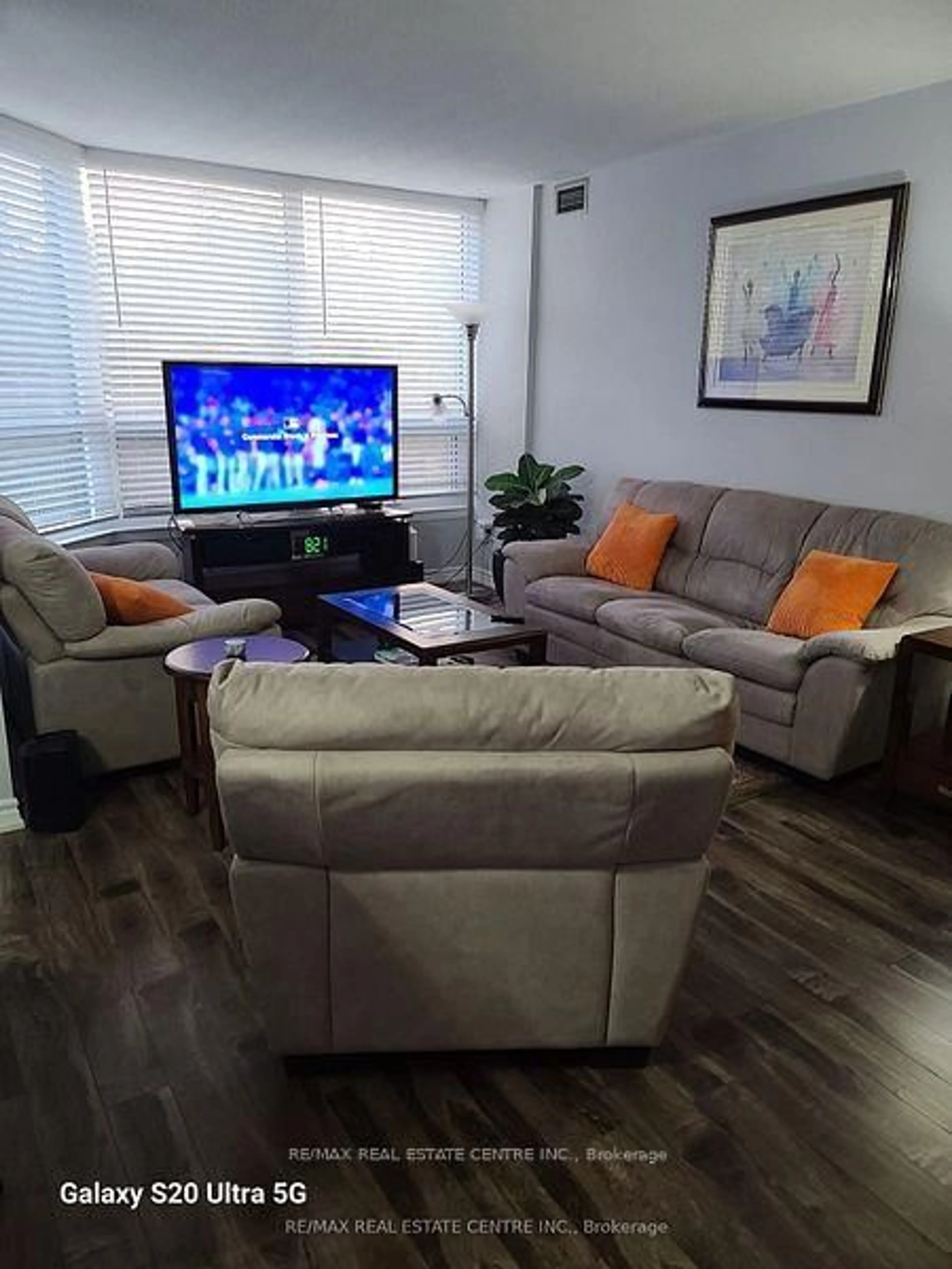 Living room with furniture, unknown for 8 Lisa St #407, Brampton Ontario L6T 4S6