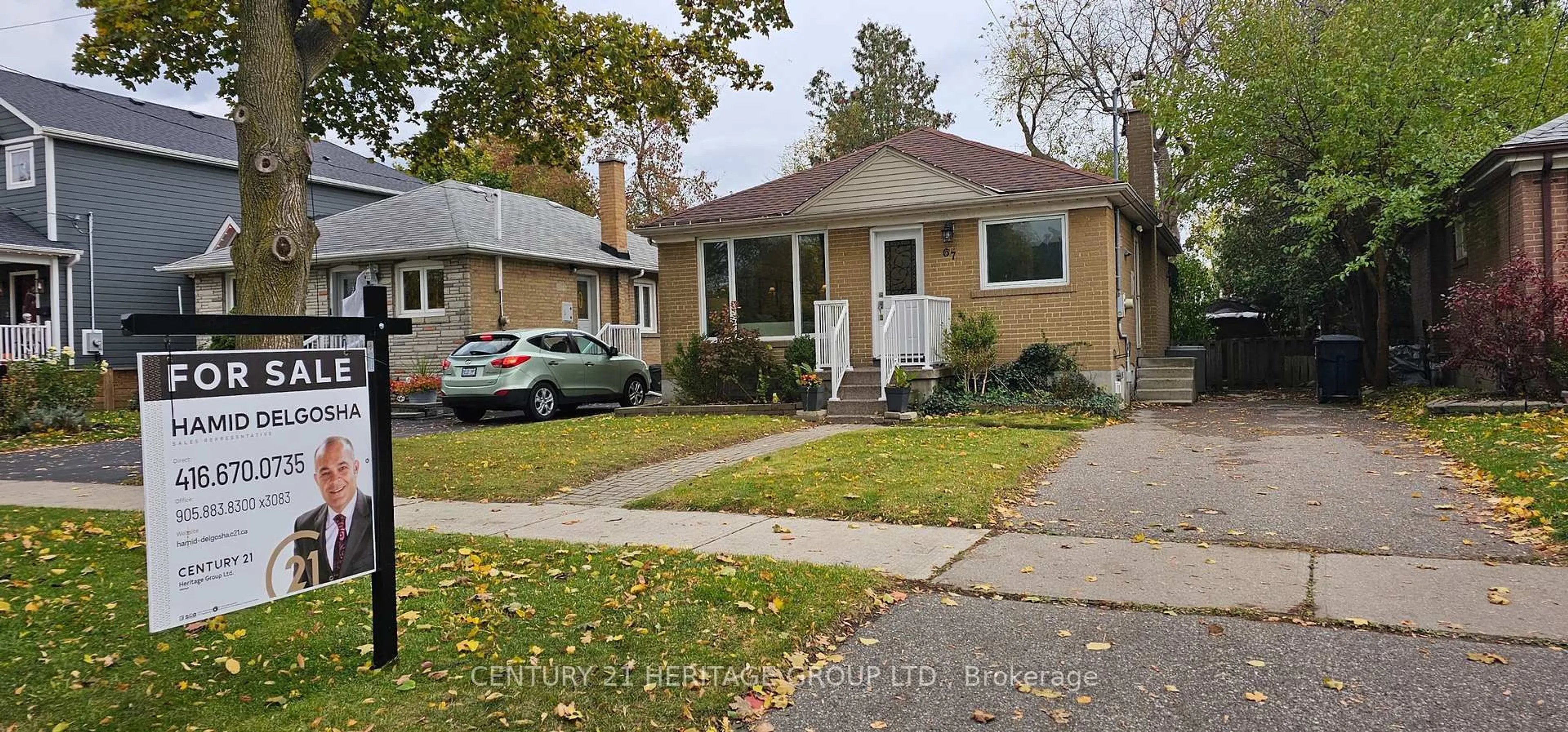 Home with brick exterior material, street for 67 Savona Dr, Toronto Ontario M8W 4V2