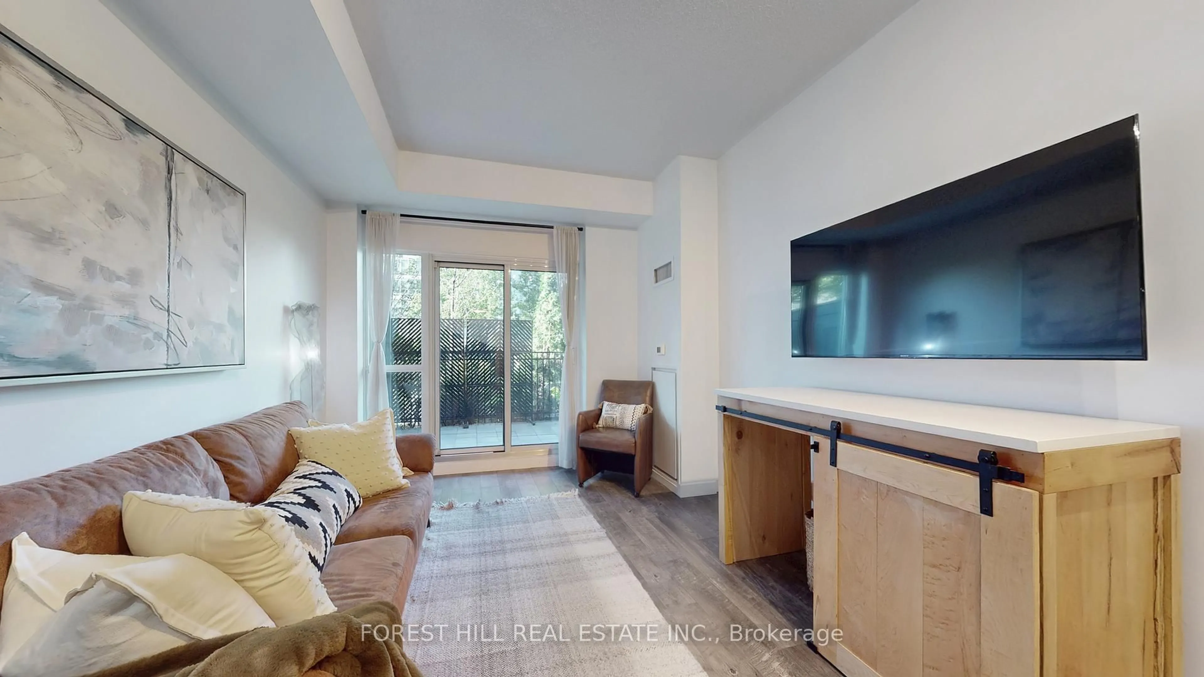 Living room with furniture, ceramic/tile floor for 165 Legion Rd #434, Toronto Ontario M8Y 0A1