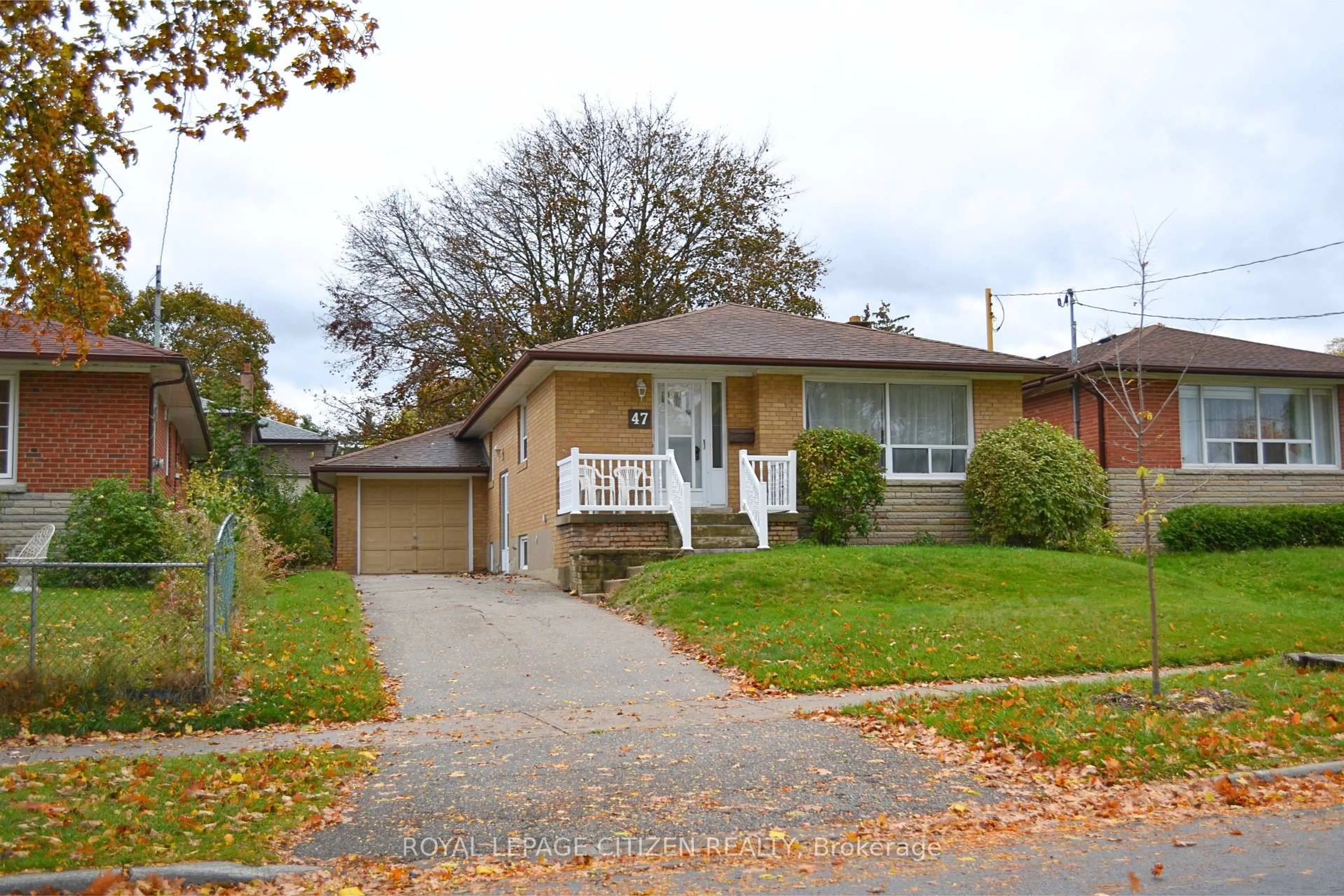 Home with brick exterior material, street for 47 Barkwin Dr, Toronto Ontario M9V 2W5