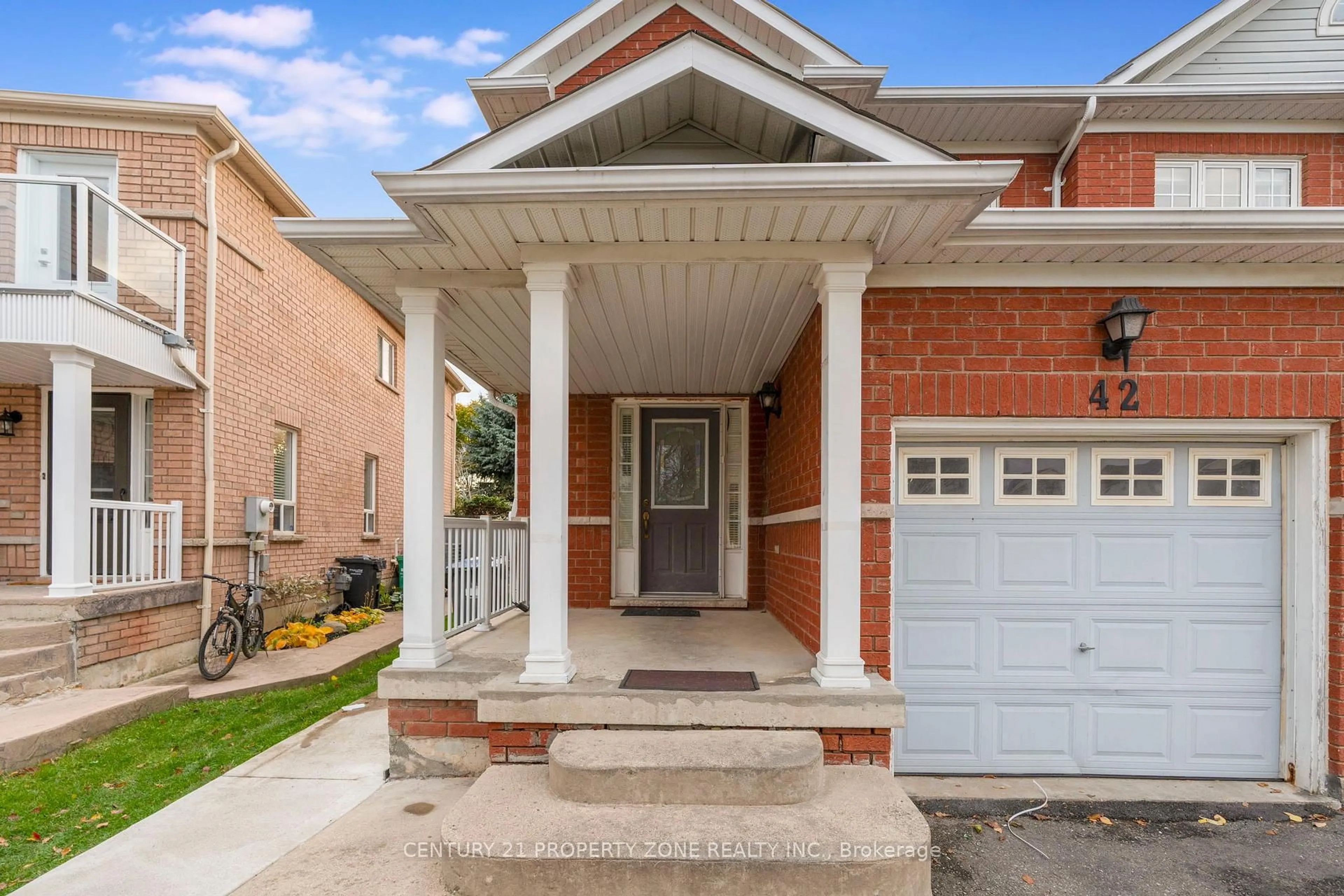 Home with brick exterior material, street for 42 Mossgrove Cres, Brampton Ontario L7A 3E6