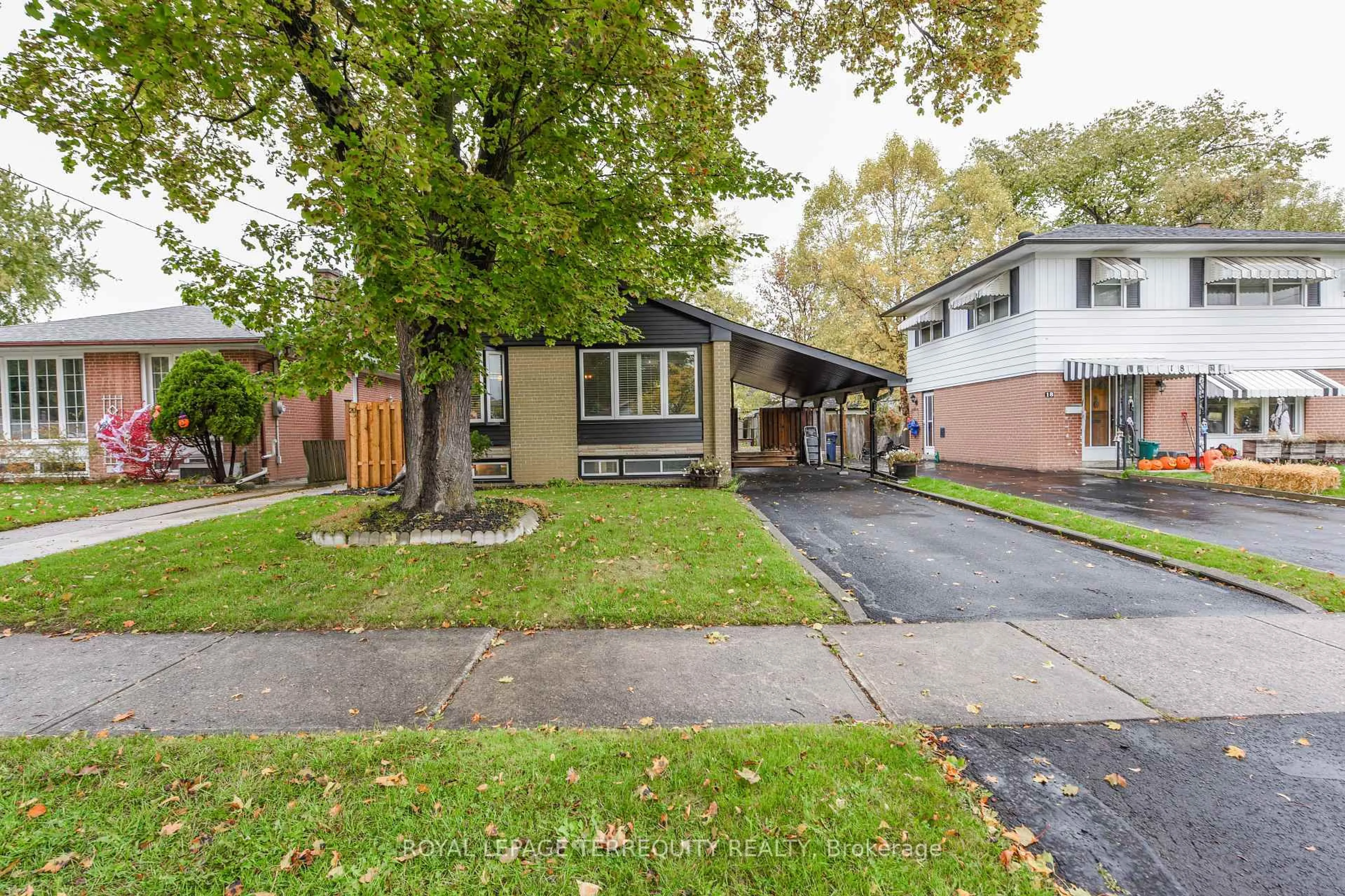 Home with brick exterior material, street for 20 Hallow Cres, Toronto Ontario M9W 2V9