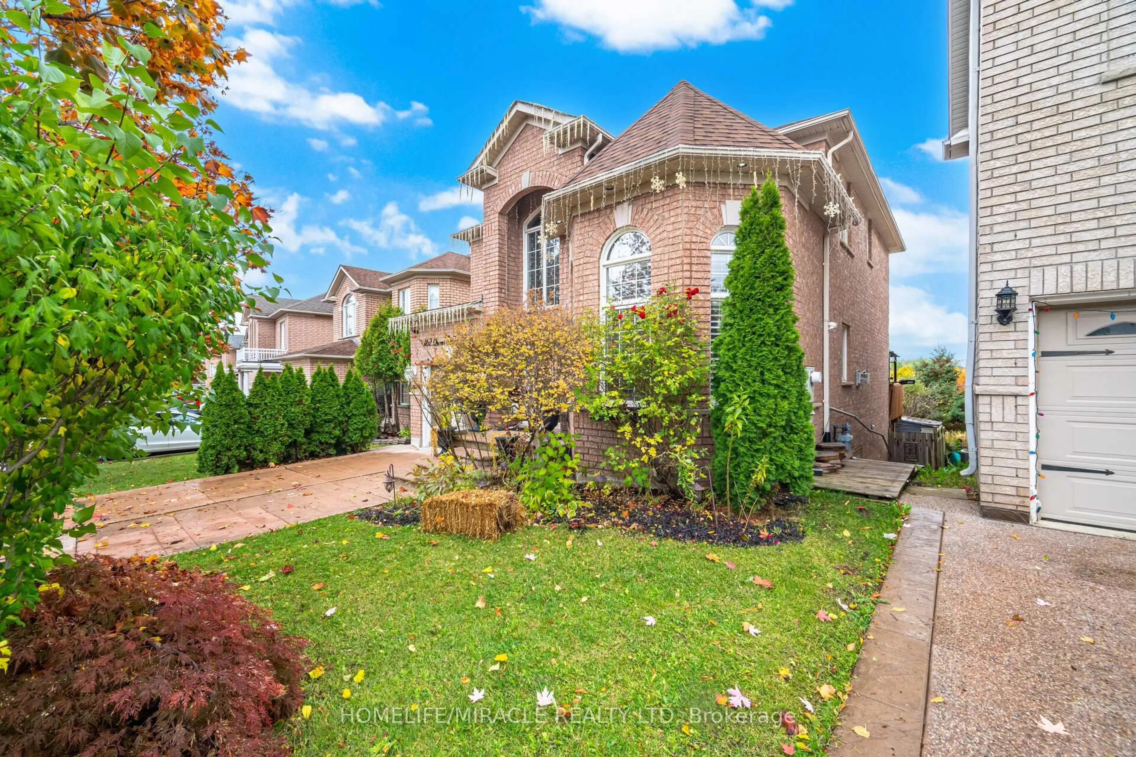 Home with brick exterior material, street for 62 Queen Mary Dr, Brampton Ontario L7A 2K3
