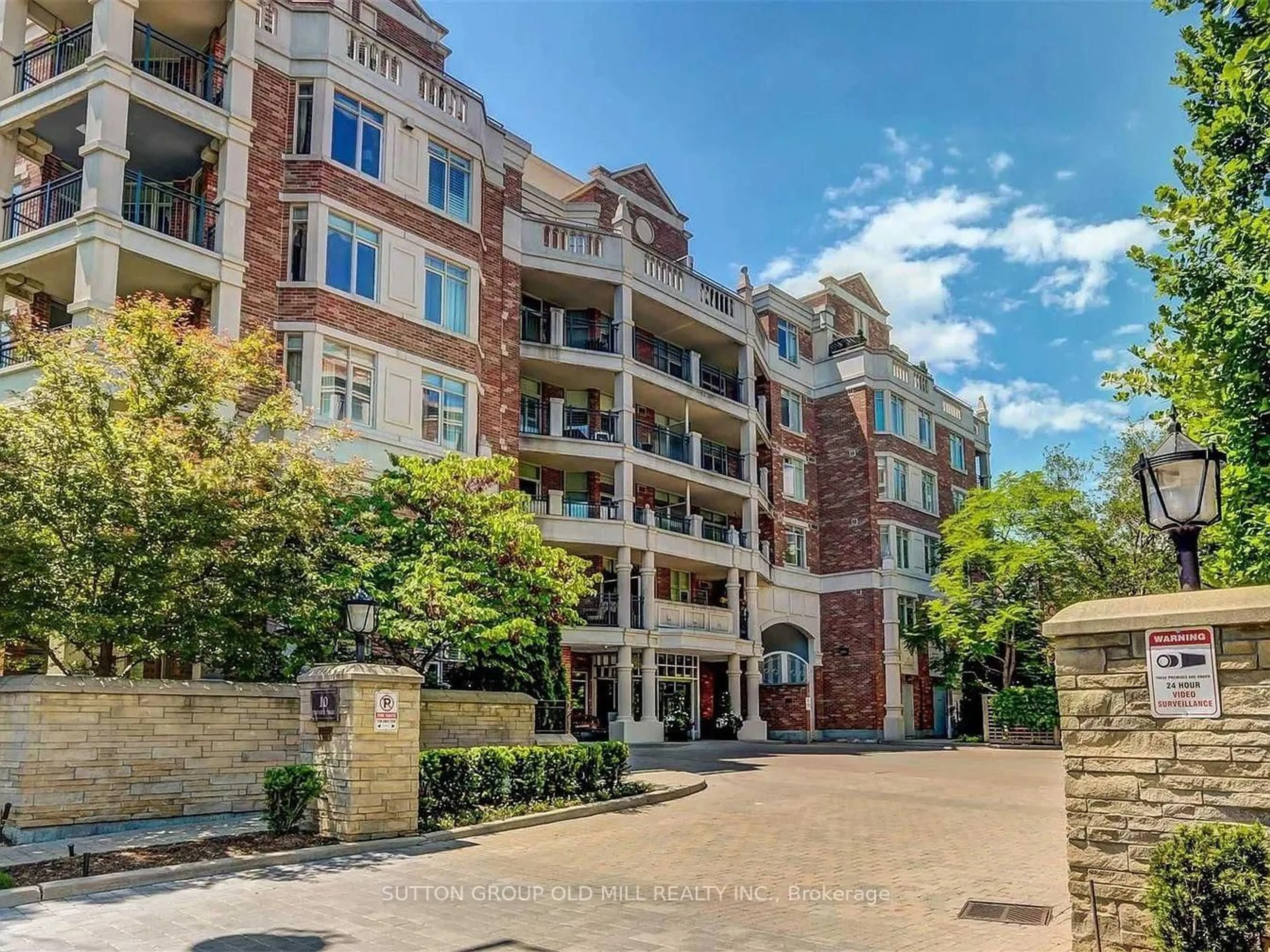 A pic from outside/outdoor area/front of a property/back of a property/a pic from drone, street for 10 Old Mill Tr #206, Toronto Ontario M8X 2Y9