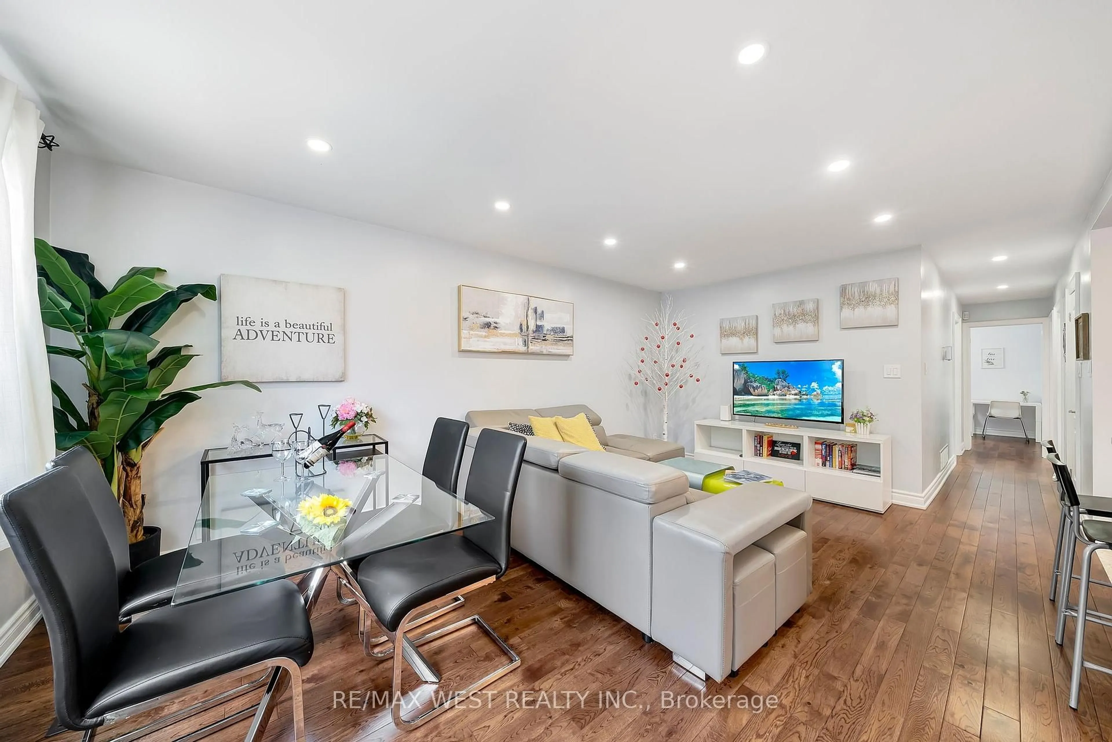 Living room with furniture, wood/laminate floor for 67 South Kingsway, Toronto Ontario M6S 3T4