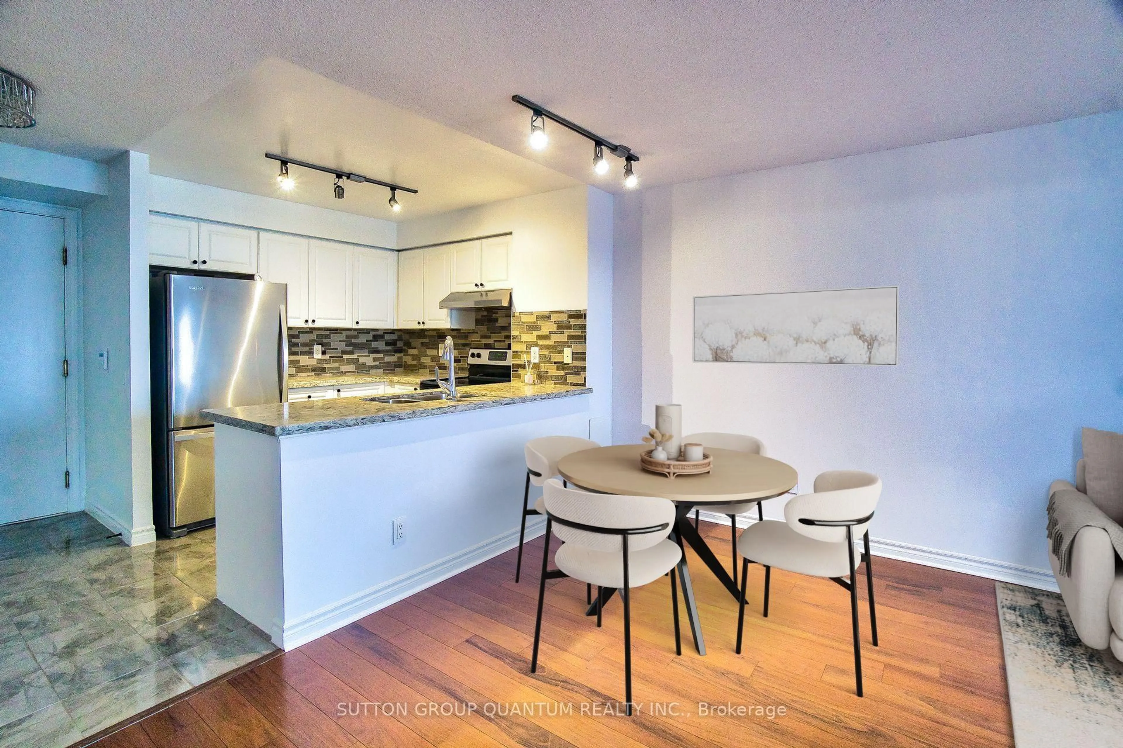 Open concept kitchen, wood/laminate floor for 25 Kingsbridge Garden Circ #716, Mississauga Ontario L5R 4B1