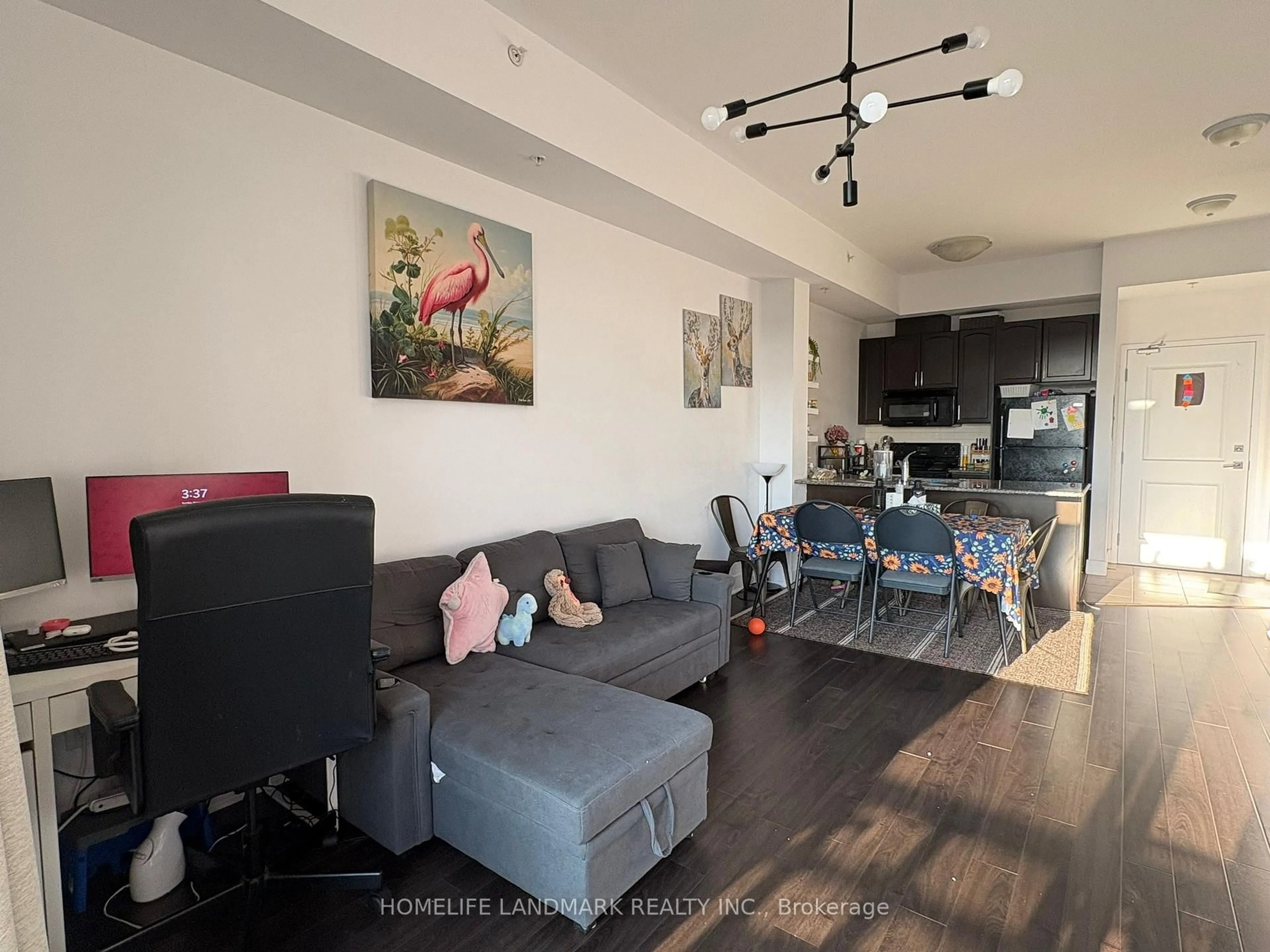Living room with furniture, wood/laminate floor for 5020 Corporate Dr #410, Burlington Ontario L7L 0H7