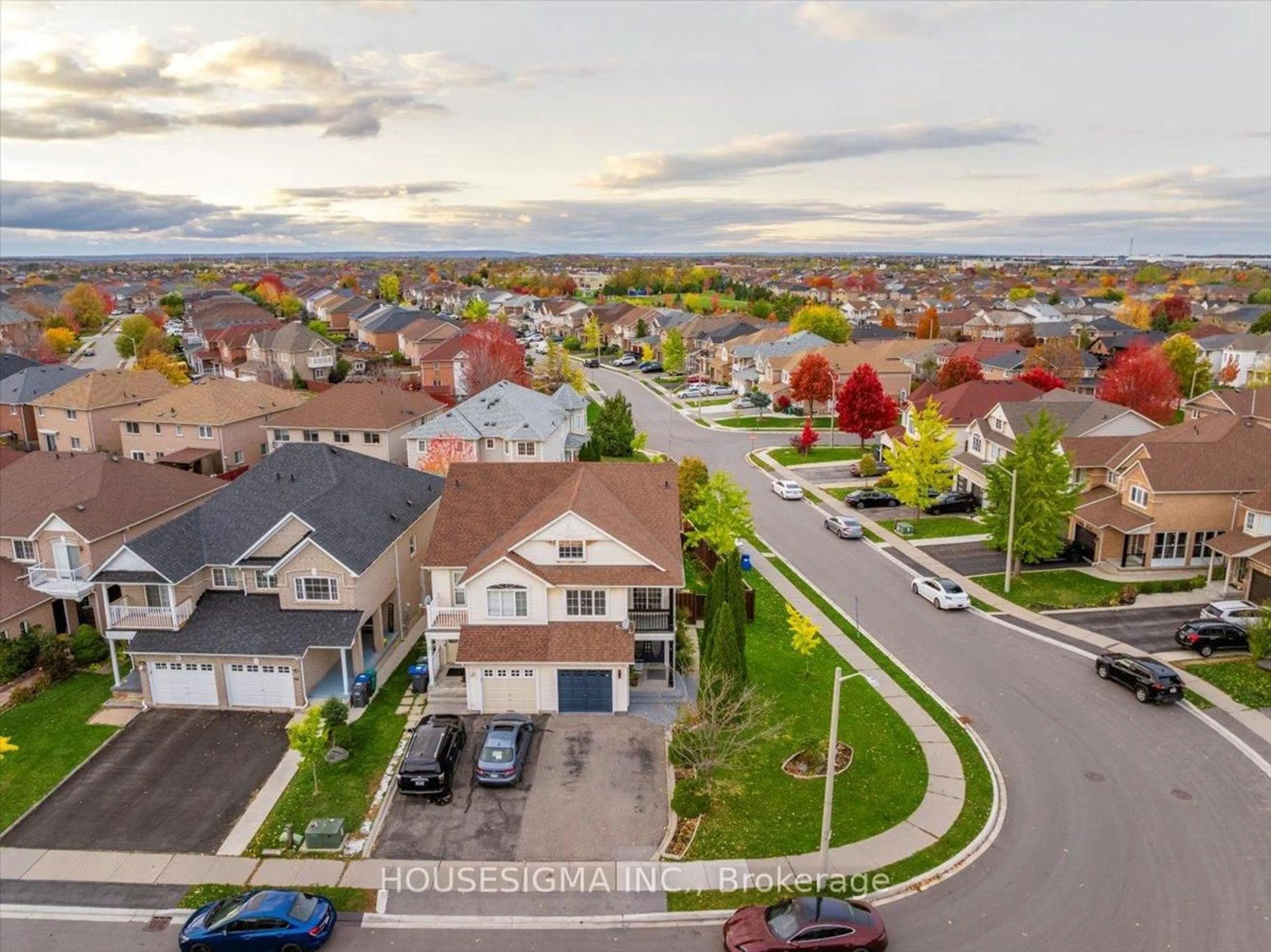 A pic from outside/outdoor area/front of a property/back of a property/a pic from drone, mountain view for 39 Weather Vane Lane, Brampton Ontario L6X 4R4