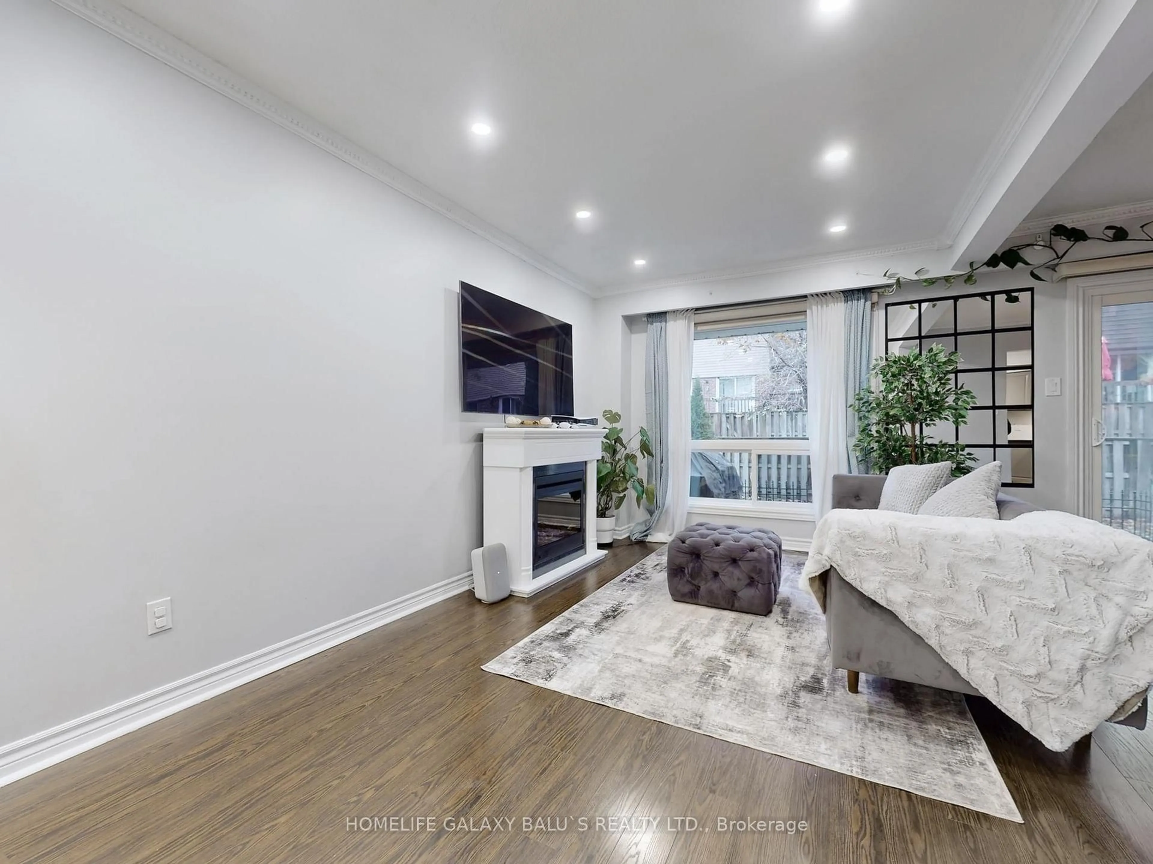 Living room with furniture, unknown for 830 Stainton Dr #65, Mississauga Ontario L5C 2Z3