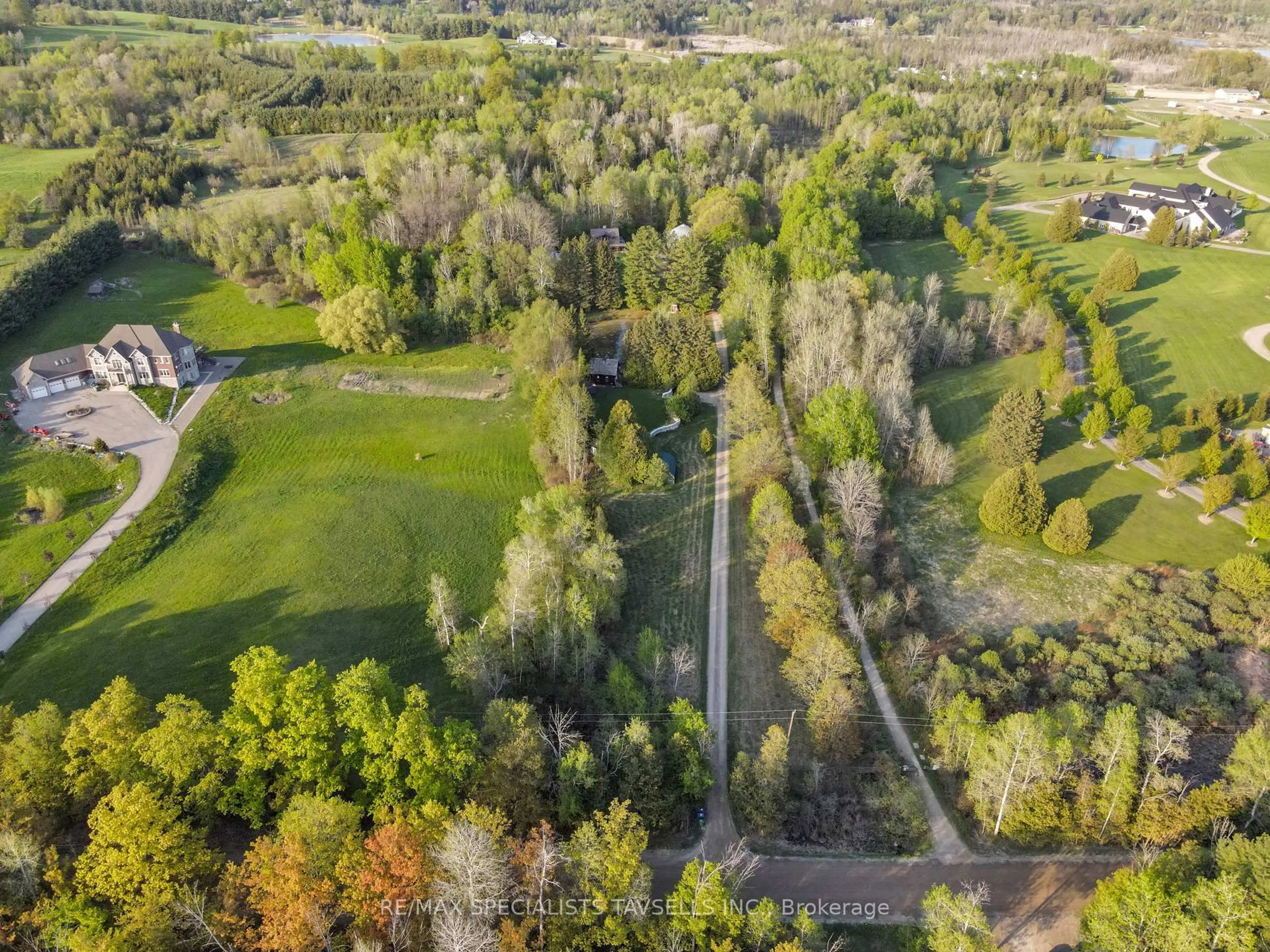 A pic from outside/outdoor area/front of a property/back of a property/a pic from drone, forest/trees view for 15993 Kennedy Rd, Caledon Ontario L7C 2H8
