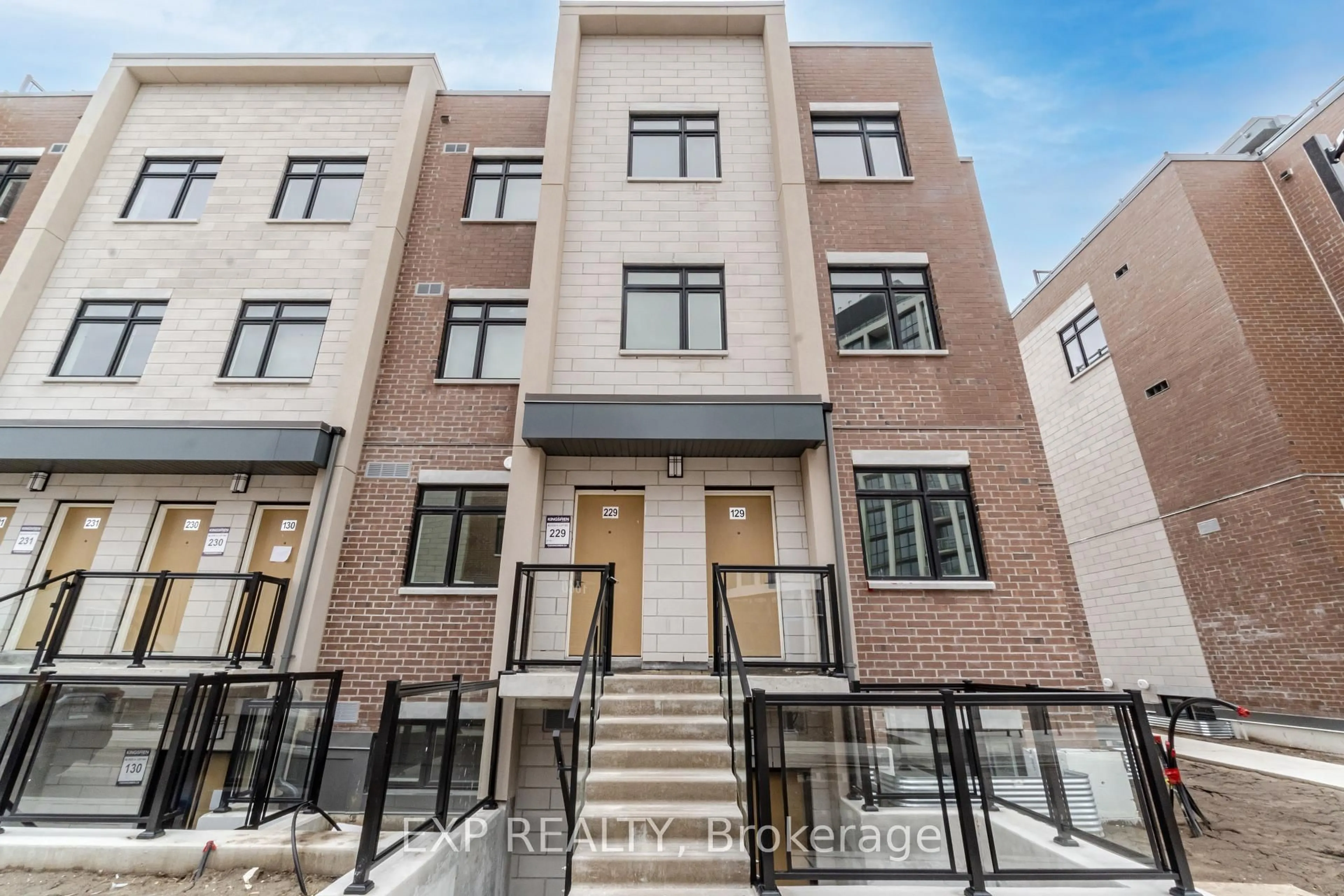 Home with brick exterior material, street for 1062 Douglas Mccurdy Comm Crt #229, Mississauga Ontario L5G 0C6