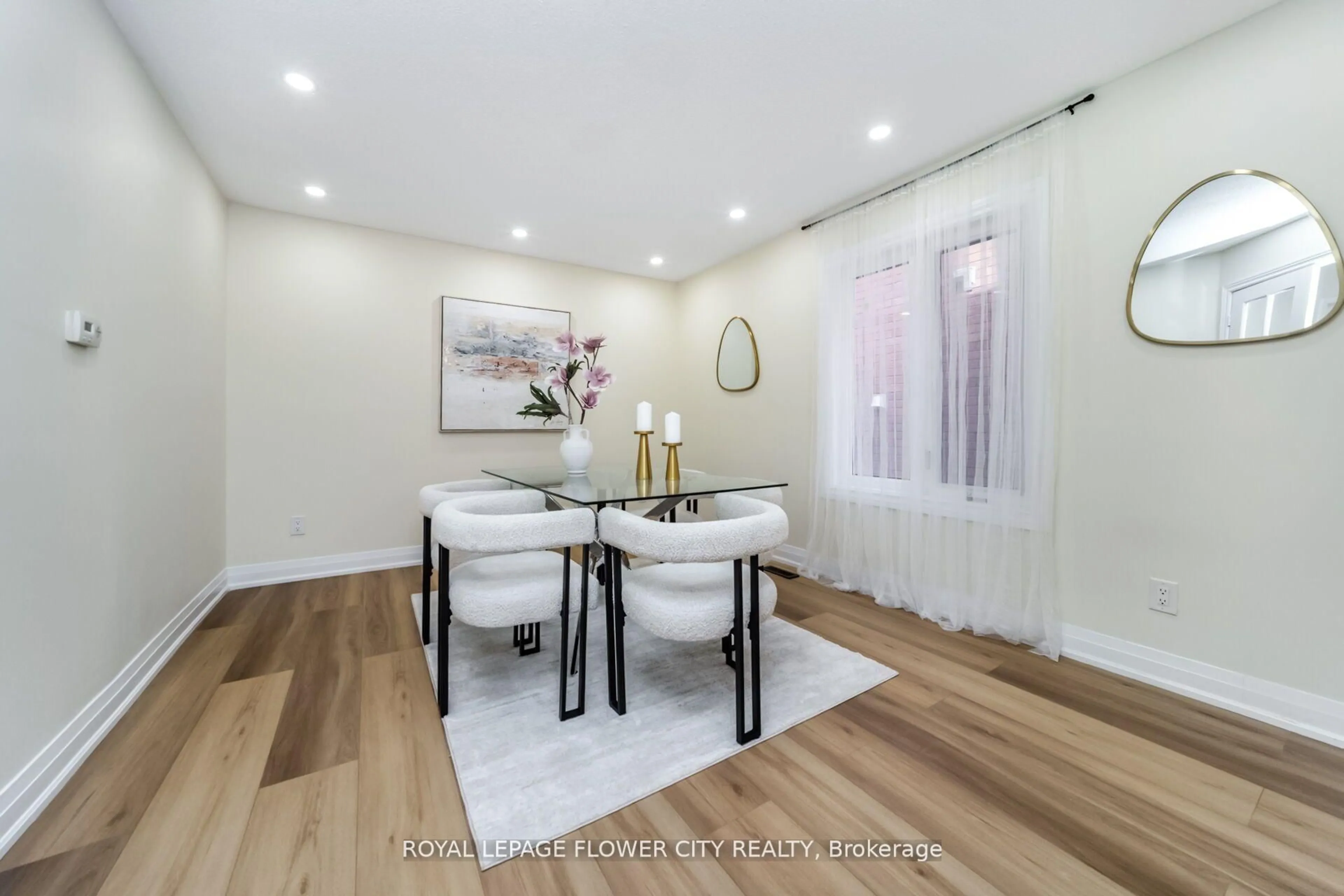 Dining room, wood/laminate floor for 4 Natalie Crt, Brampton Ontario L6S 5T2