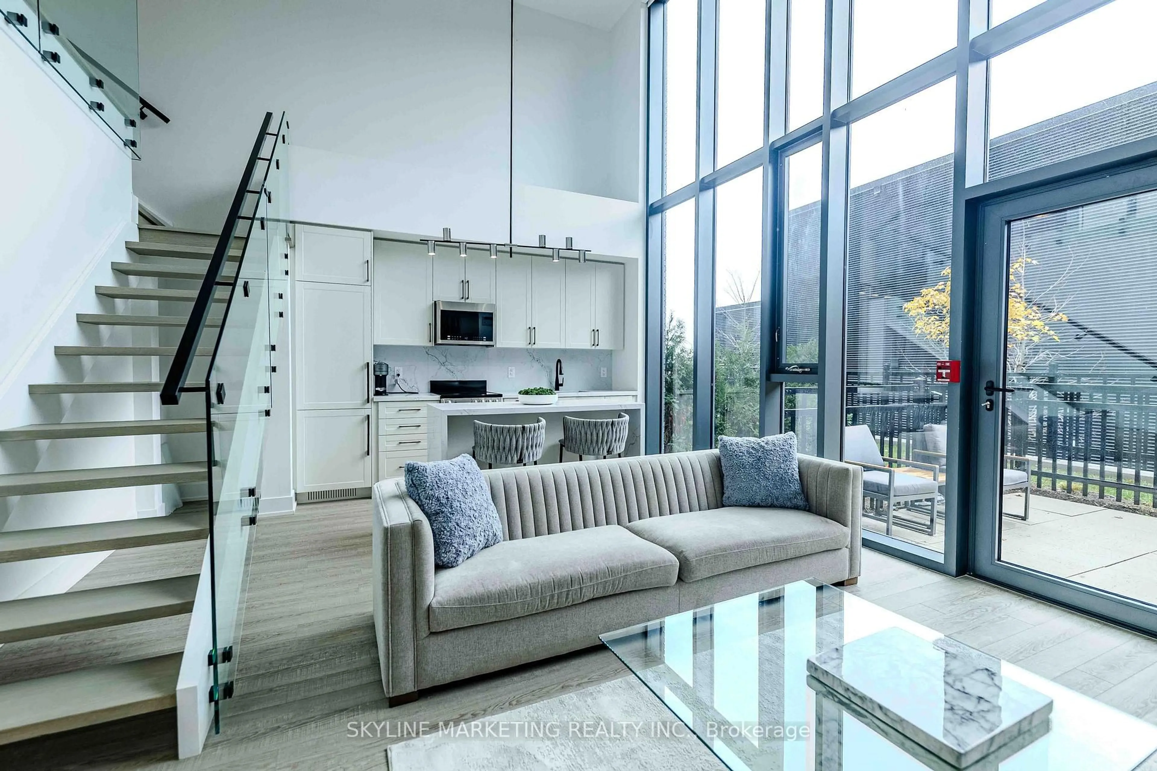 Living room with furniture, unknown for 2450 Old Bronte Rd #104, Oakville Ontario L6M 5P6