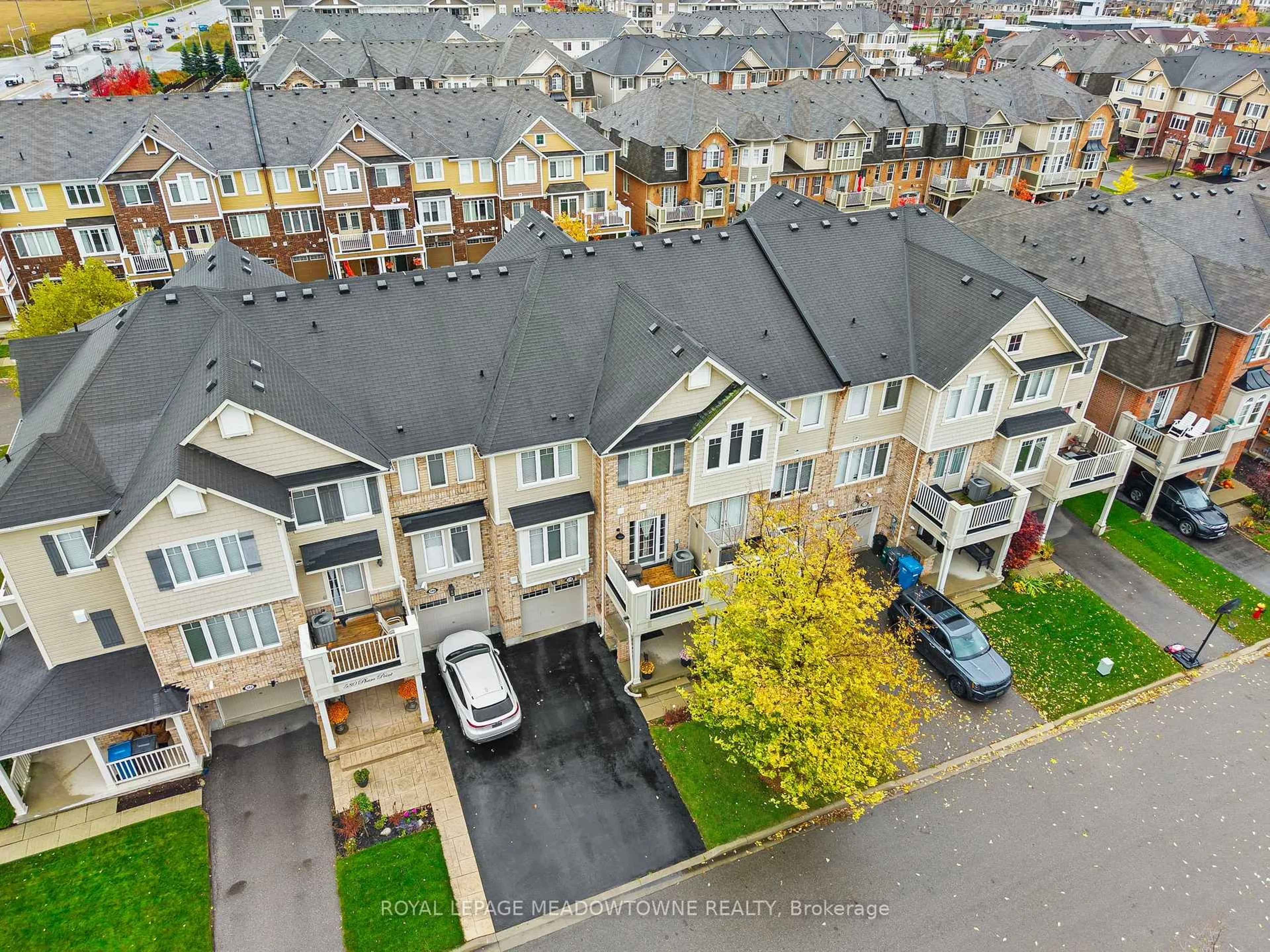 A pic from outside/outdoor area/front of a property/back of a property/a pic from drone, street for 578 Pharo Pt, Milton Ontario L9T 8H7