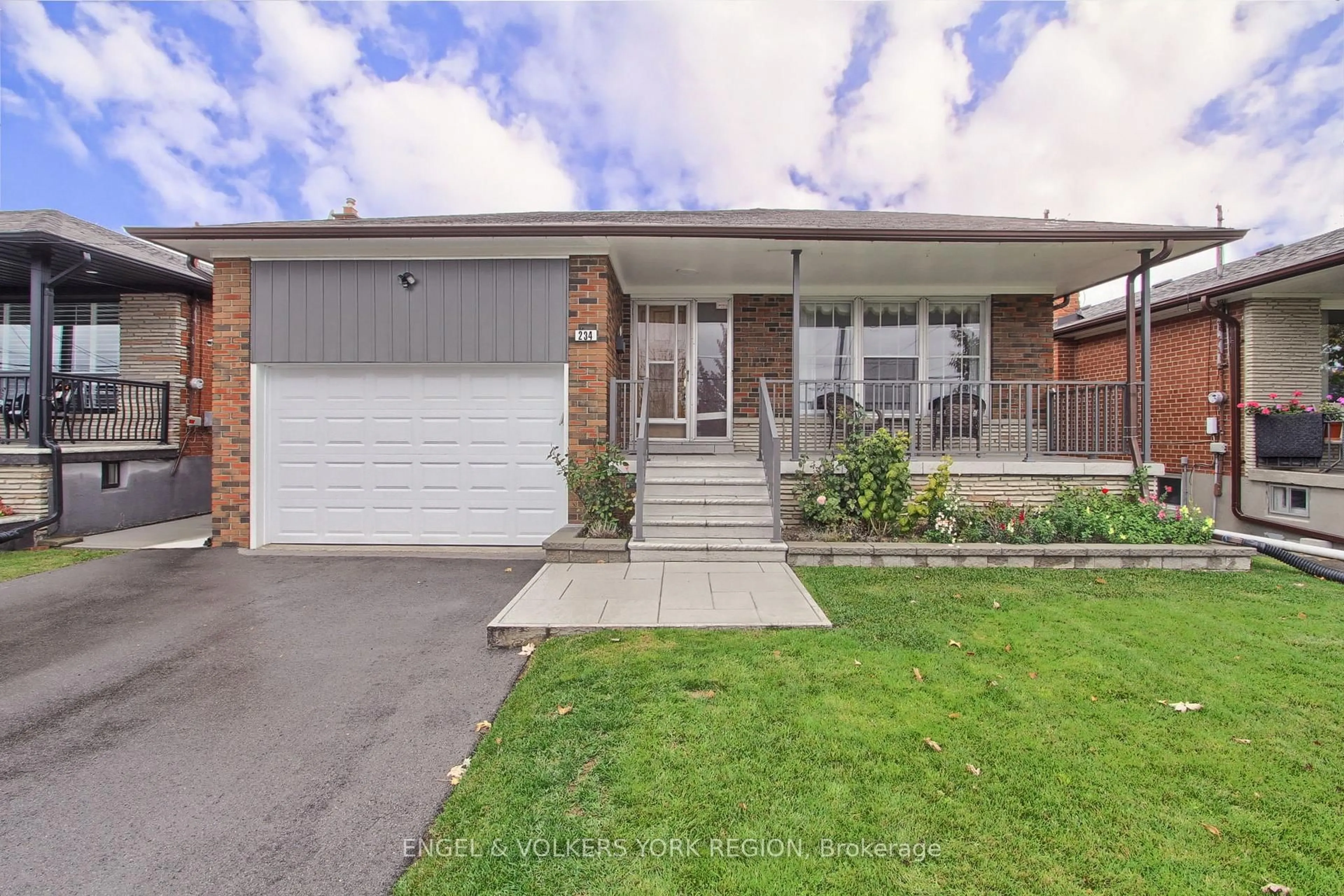 Home with brick exterior material, street for 234 Maple Leaf Dr, Toronto Ontario M6L 1P1