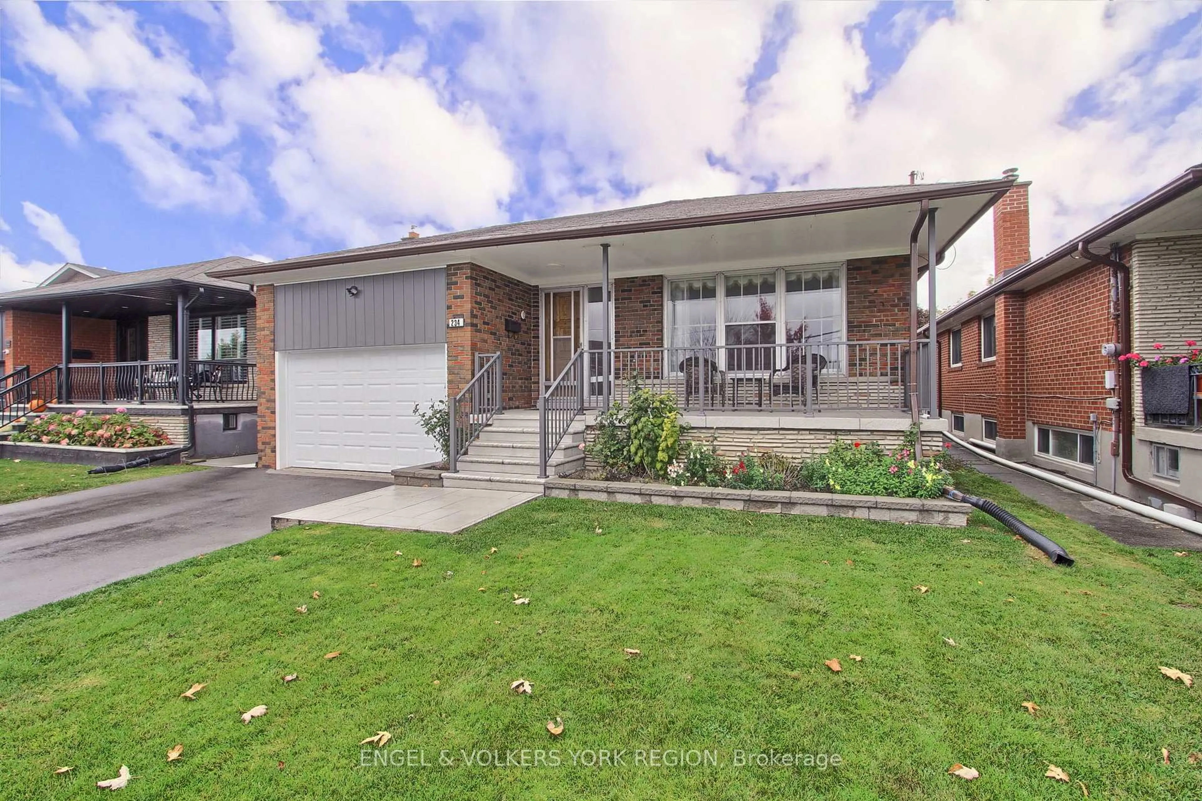 Home with brick exterior material, street for 234 Maple Leaf Dr, Toronto Ontario M6L 1P1