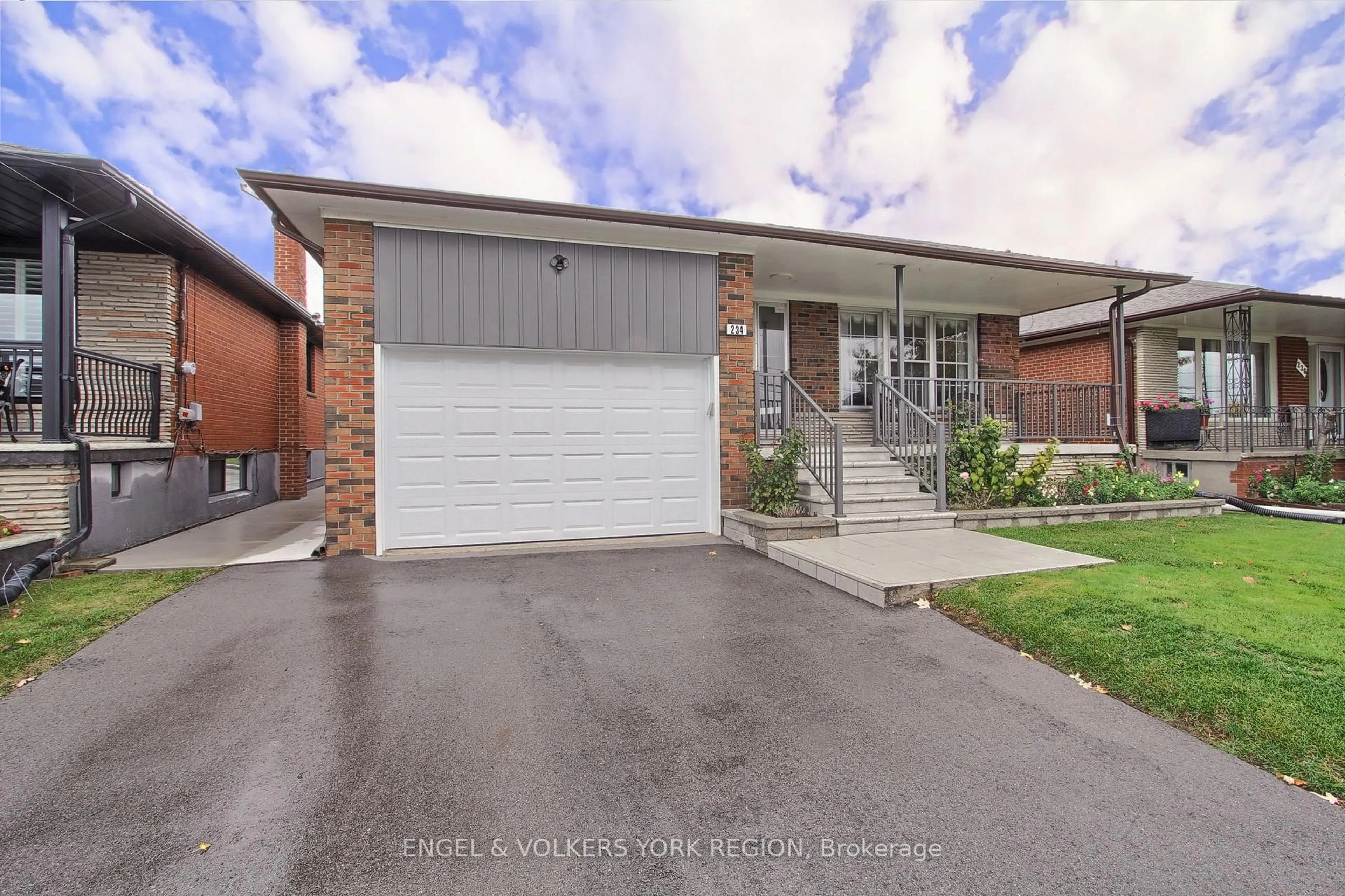 Home with brick exterior material, street for 234 Maple Leaf Dr, Toronto Ontario M6L 1P1