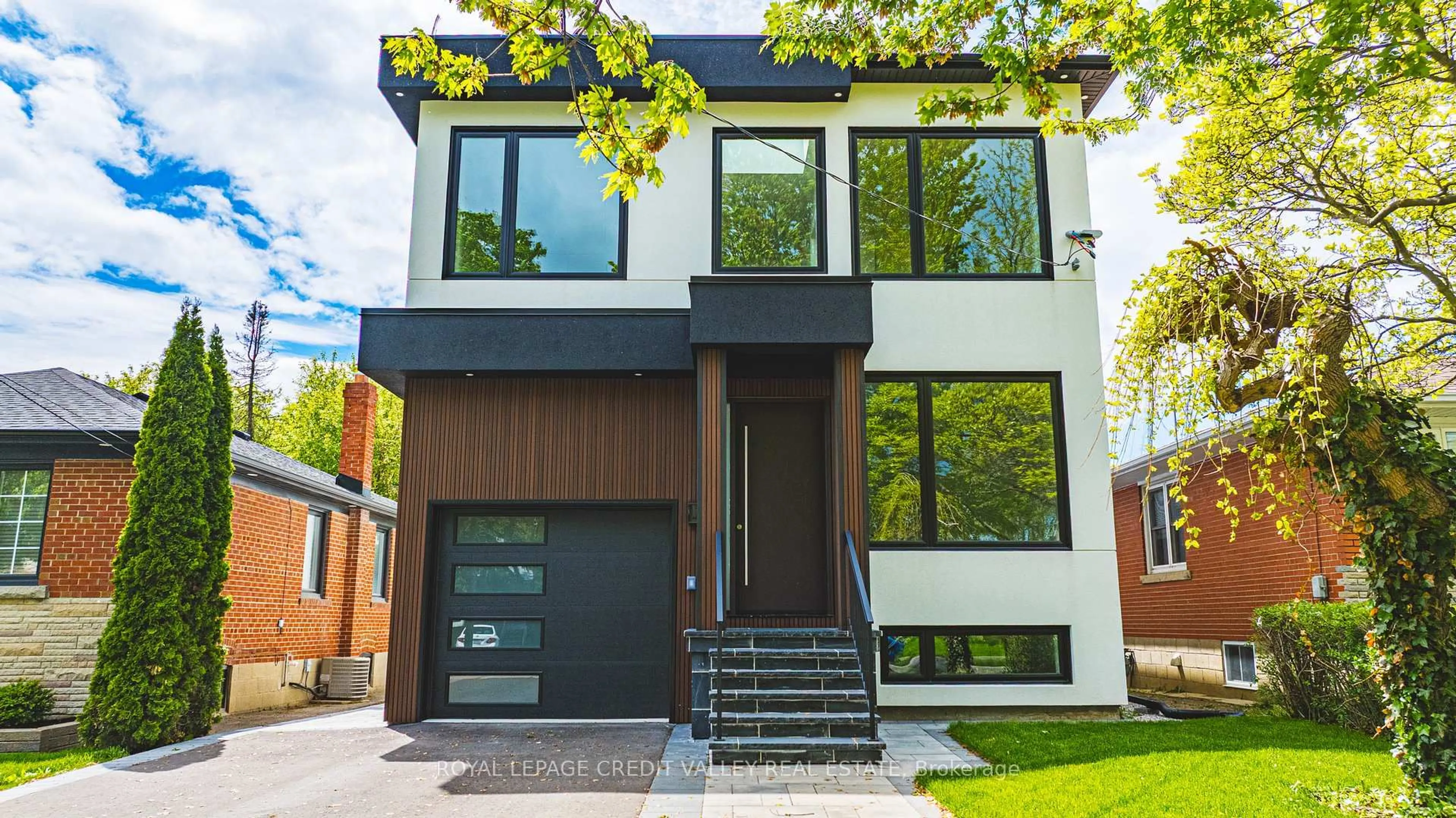 Home with brick exterior material, street for 18 Bellman Ave, Toronto Ontario M8W 4A3