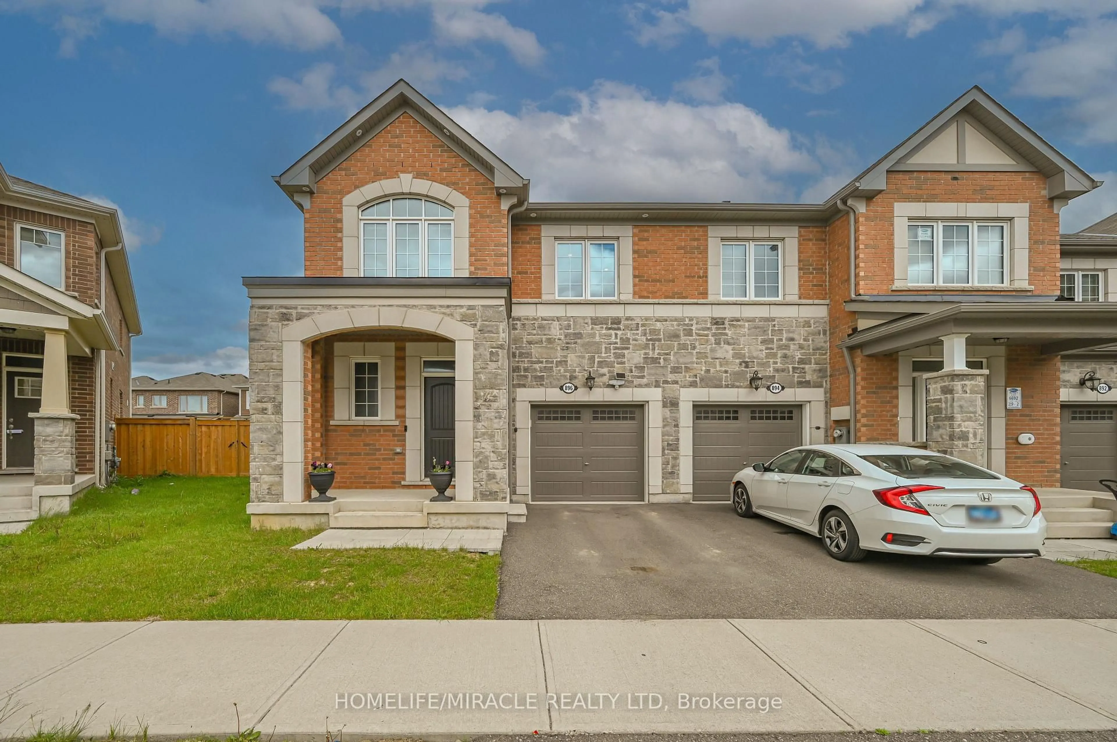 Home with brick exterior material, street for 896 Sumac Cres, Milton Ontario L9E 1R7