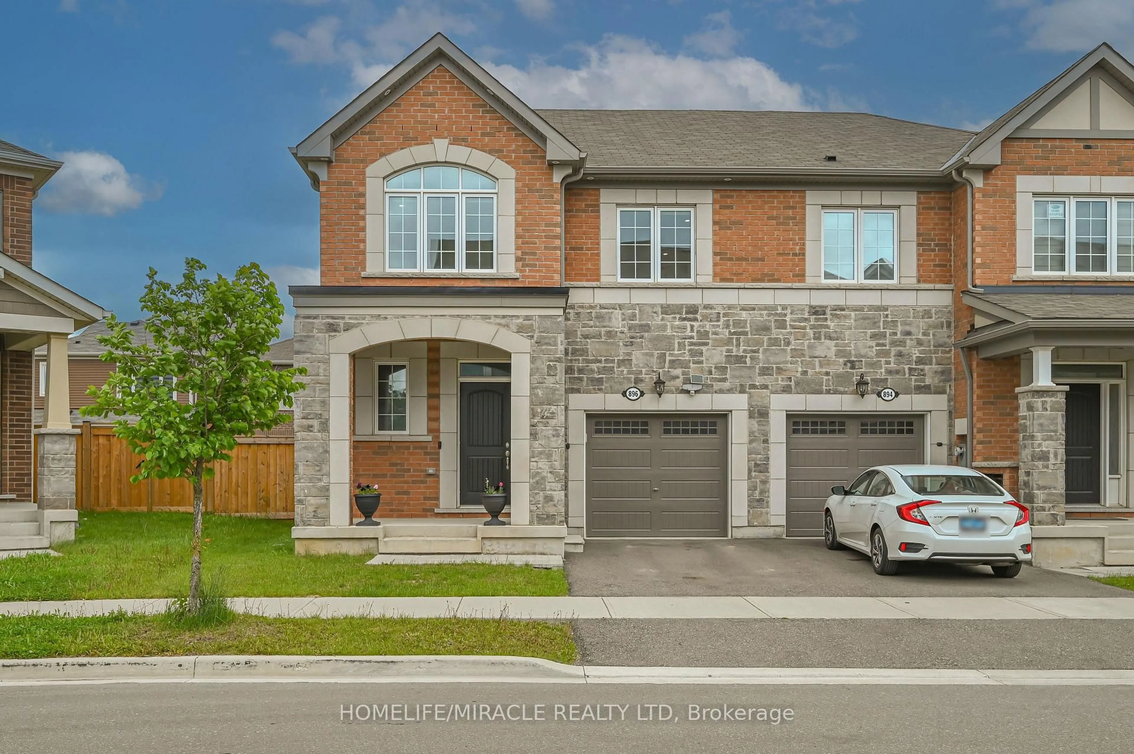 Home with brick exterior material, street for 896 Sumac Cres, Milton Ontario L9E 1R7
